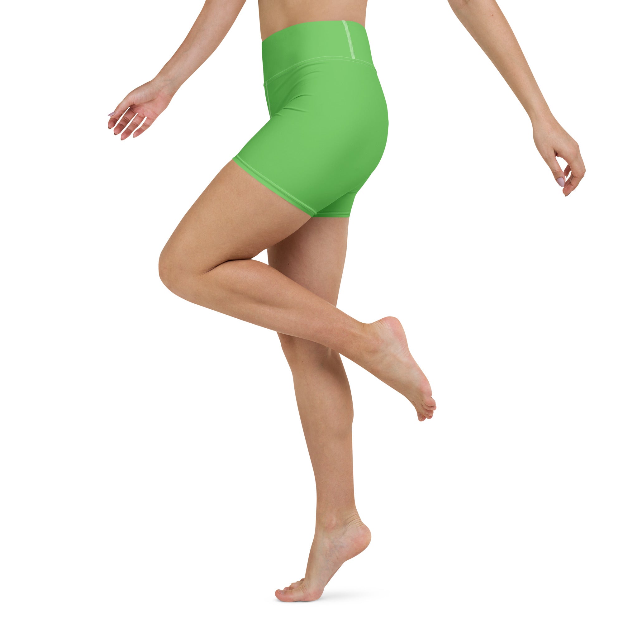 Women’s buttery soft bright green high waisted yoga shorts made from soft fabric for active comfort and style