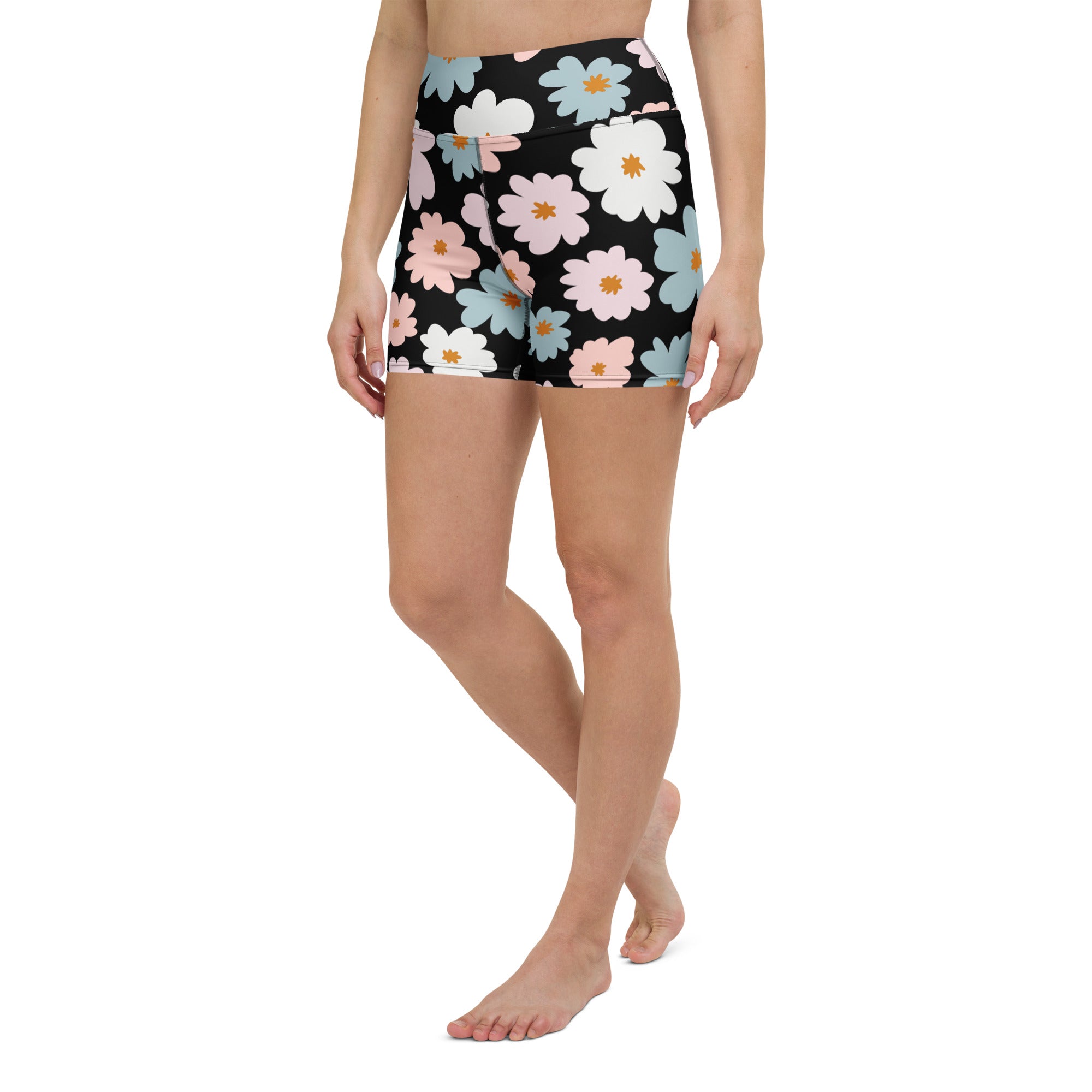 Women’s retro floral high waisted buttery soft black yoga shorts with white pink and blue daisies and yellow centers