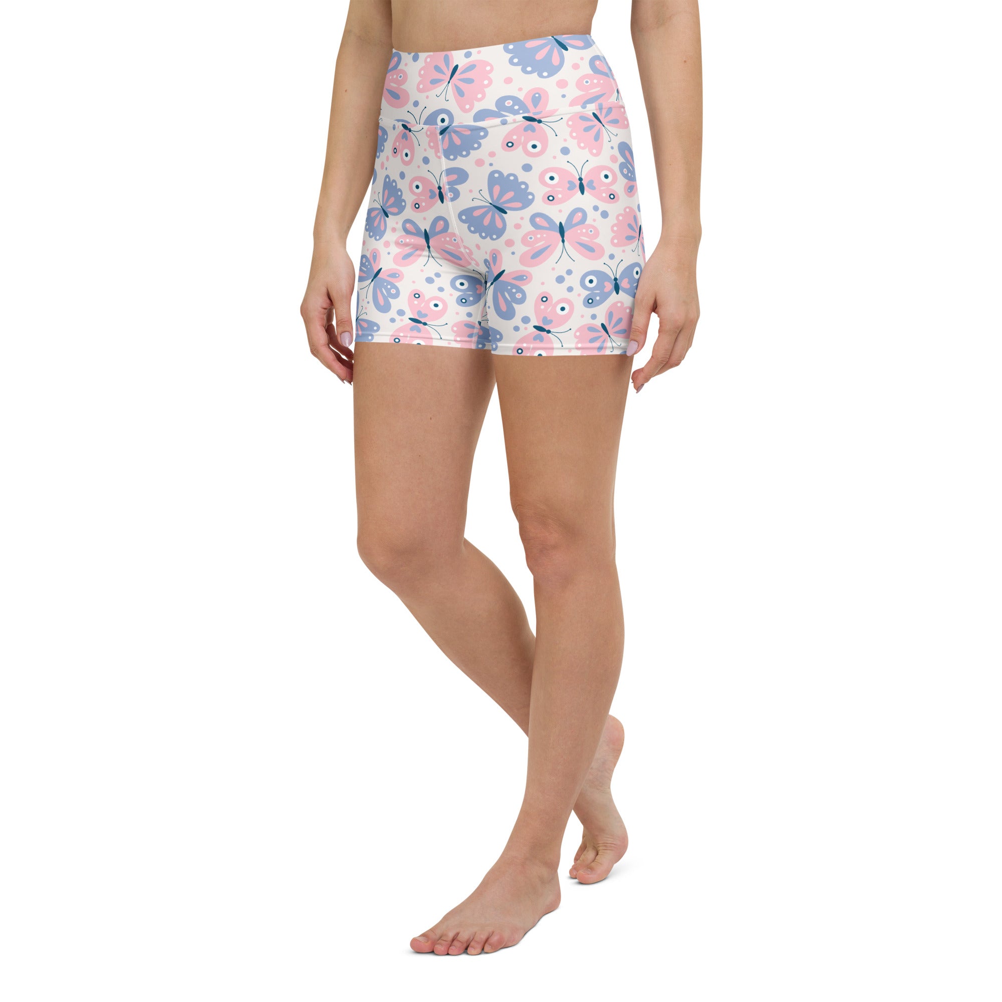 Women’s high waisted yoga shorts with pink and blue butterfly print made from buttery soft active fabric