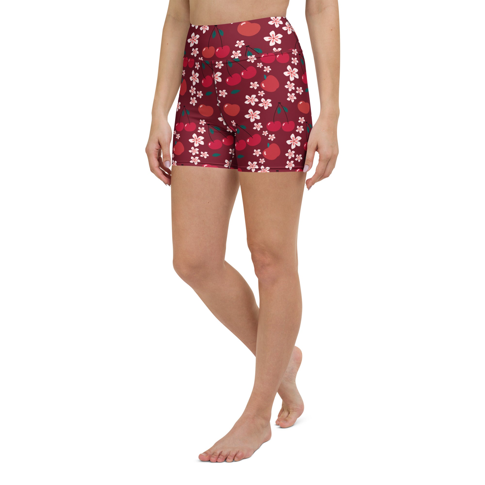 Women’s maroon high waisted buttery soft yoga shorts with playful red cherry and white blossom pattern