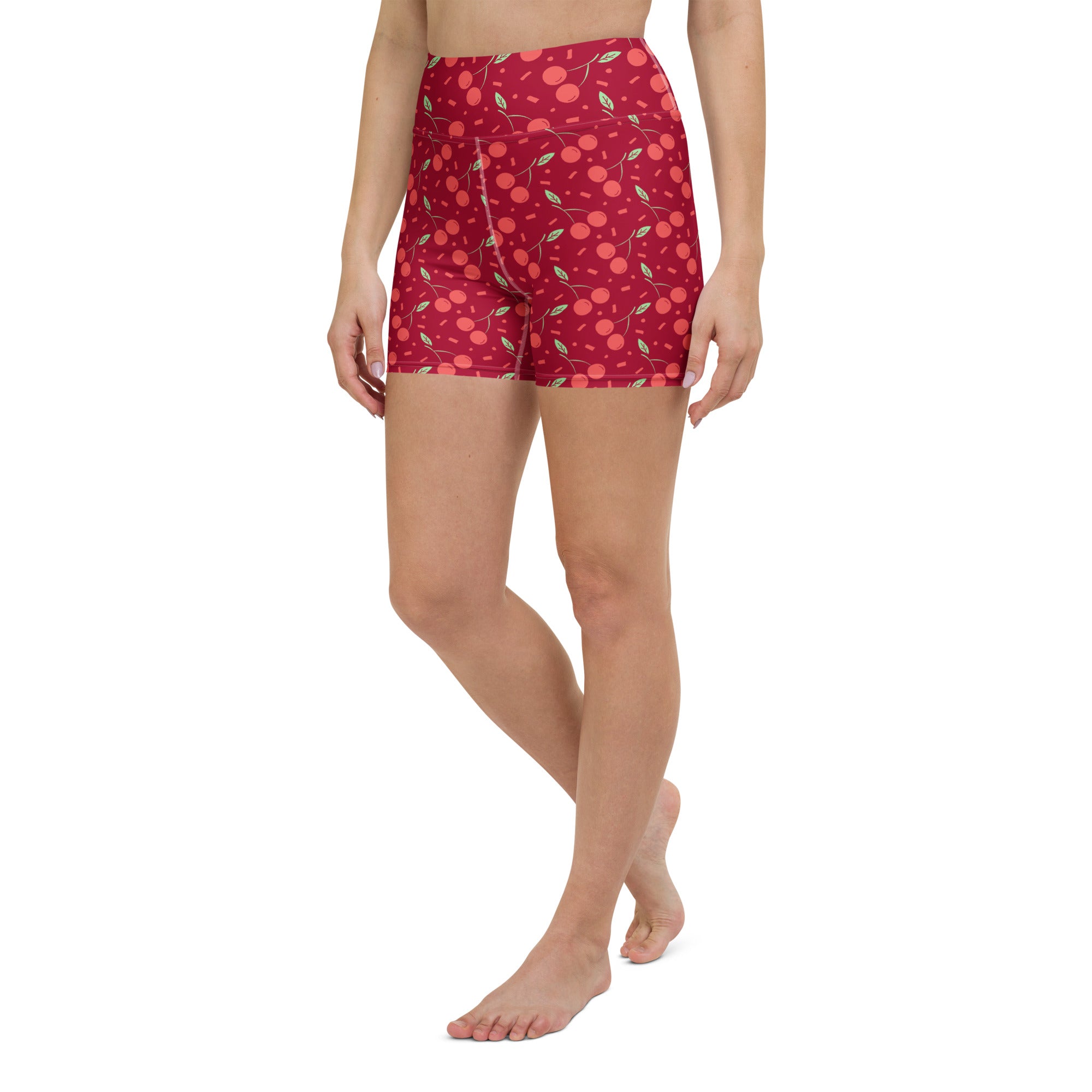 Women’s red cherry sprinkle high waisted yoga shorts made of buttery soft fabric for active wear