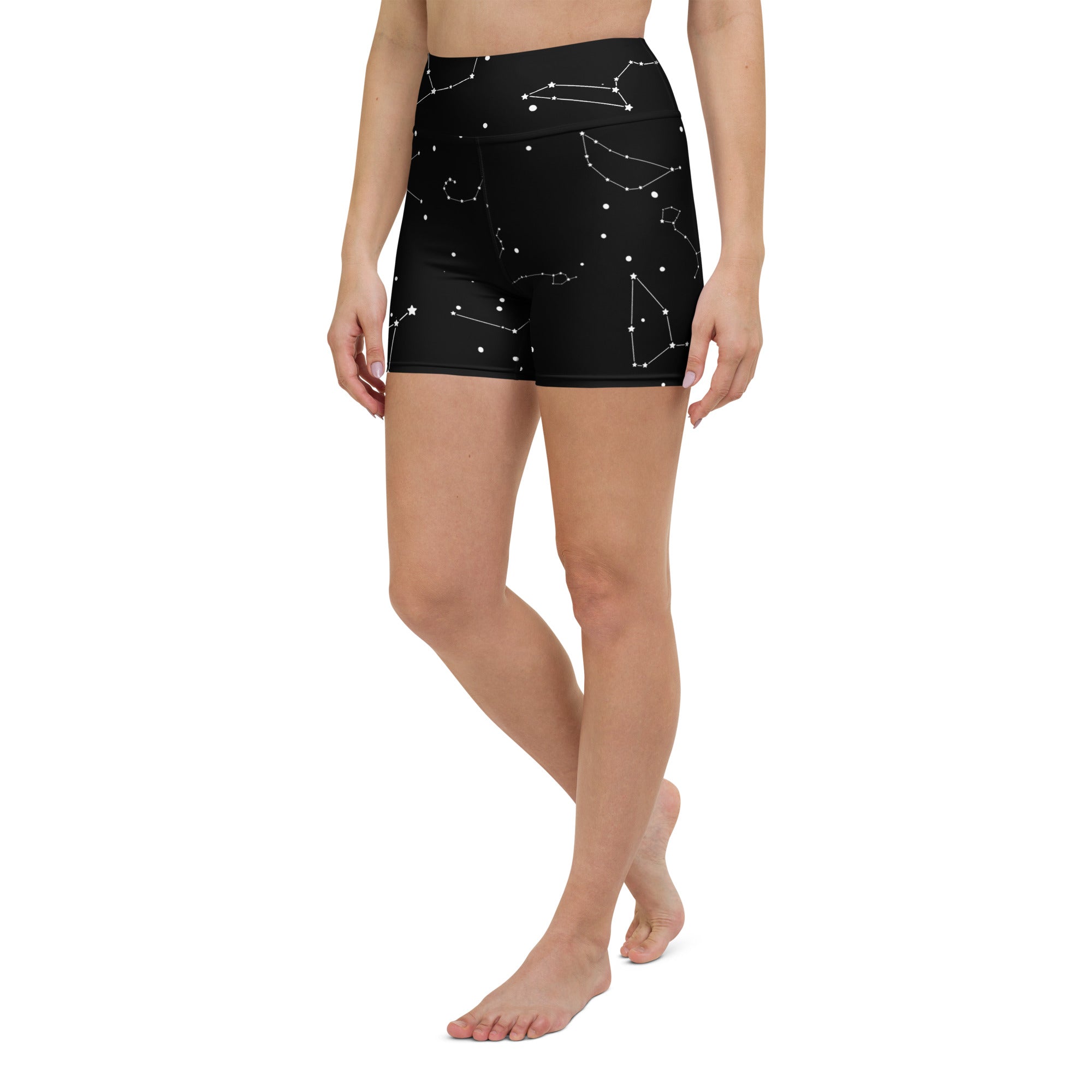 Black high-waisted buttery soft yoga shorts with white realistic constellation pattern for women