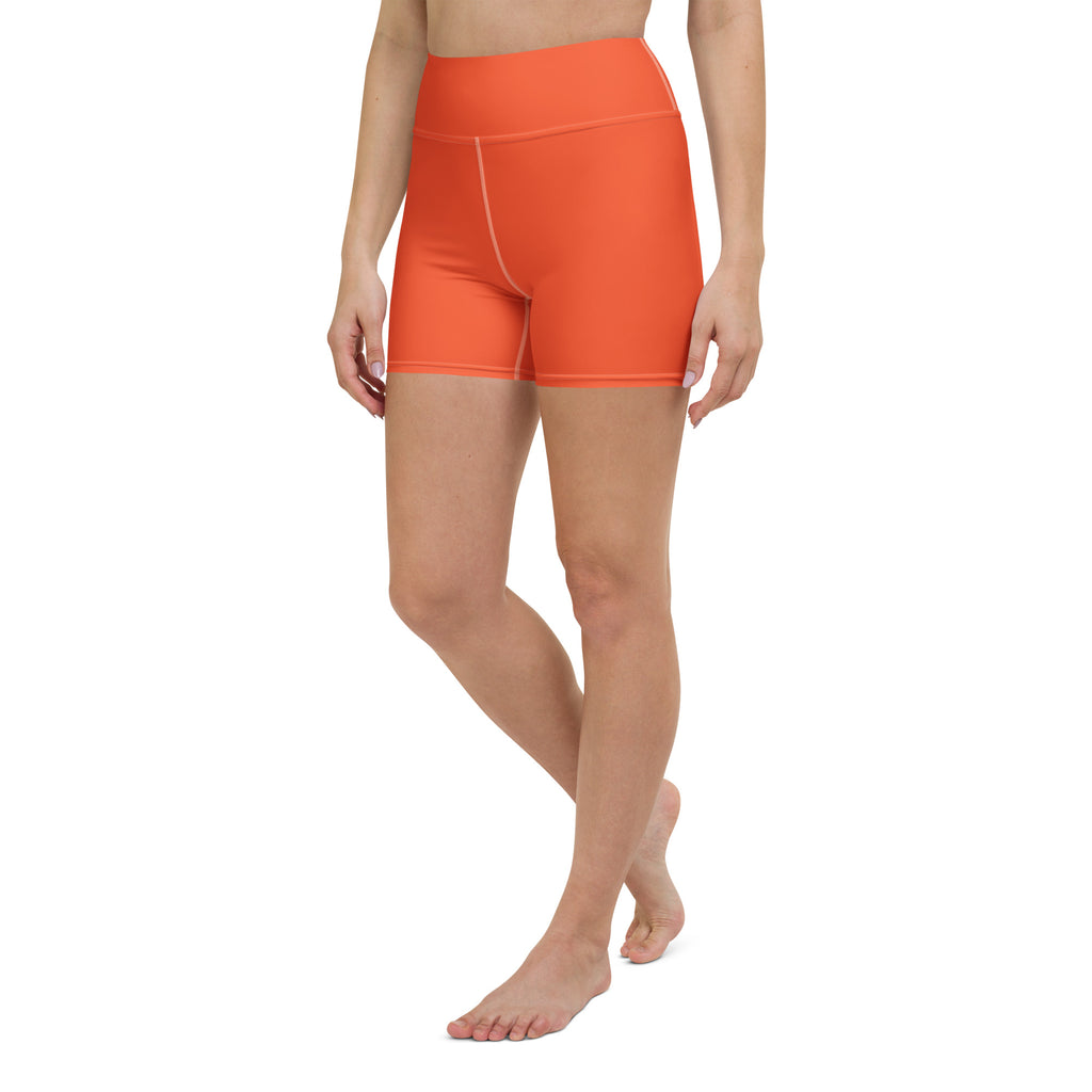 Women’s buttery soft orange high waisted yoga shorts made of smooth stretchy fabric for activewear