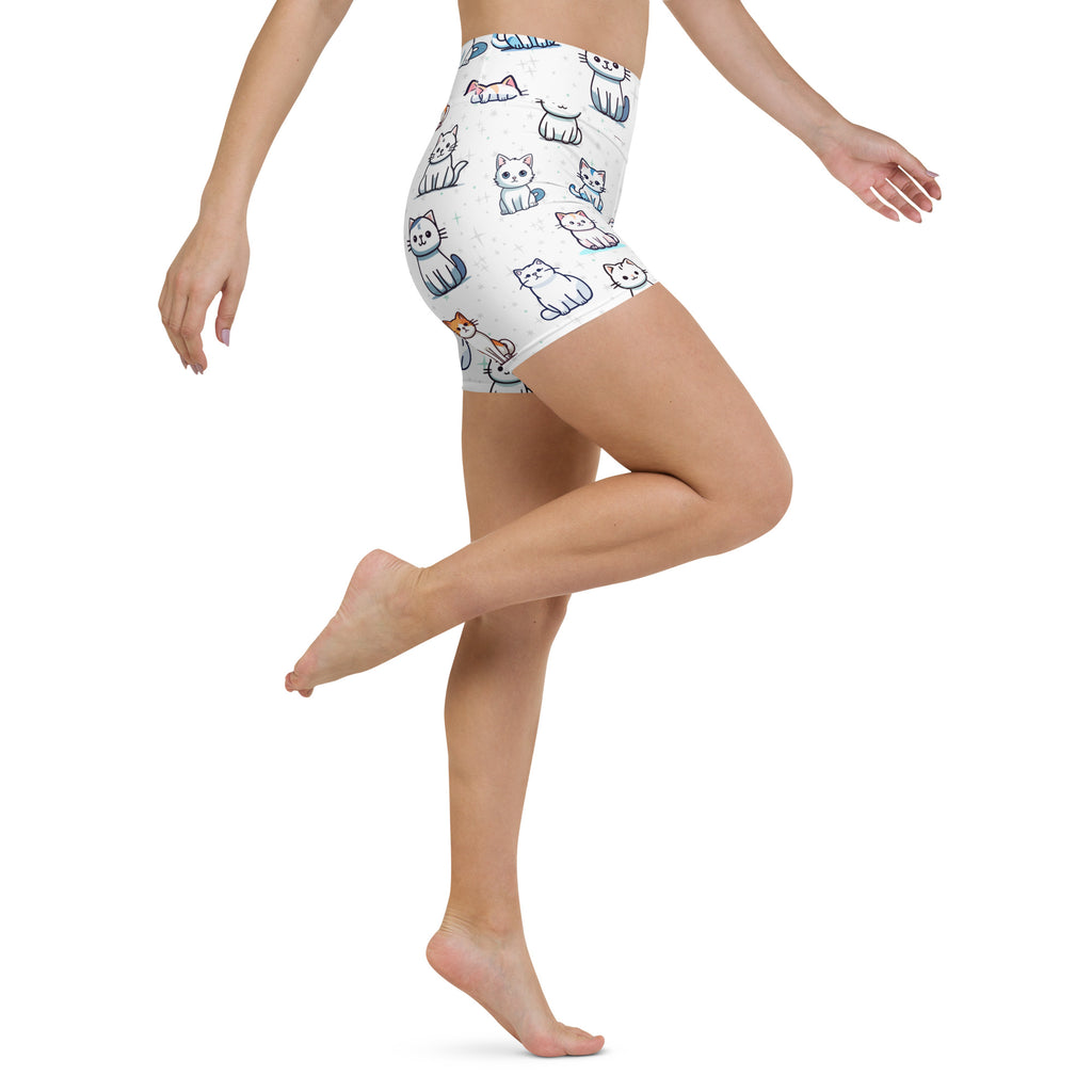 White high-waisted buttery soft yoga shorts with a playful colorful cartoon cat pattern for women