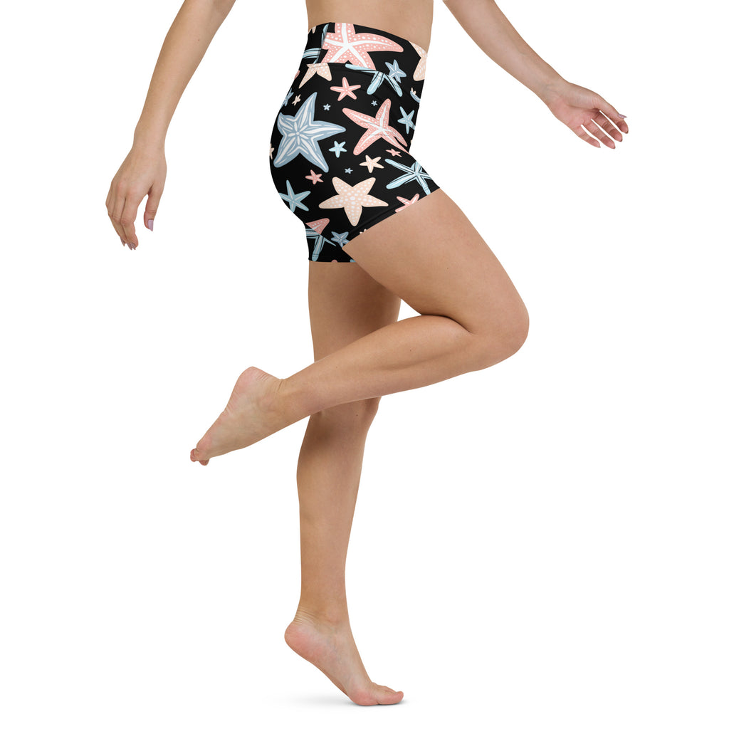 Women’s high waisted buttery soft black yoga shorts with pastel pink light blue and silver starfish pattern