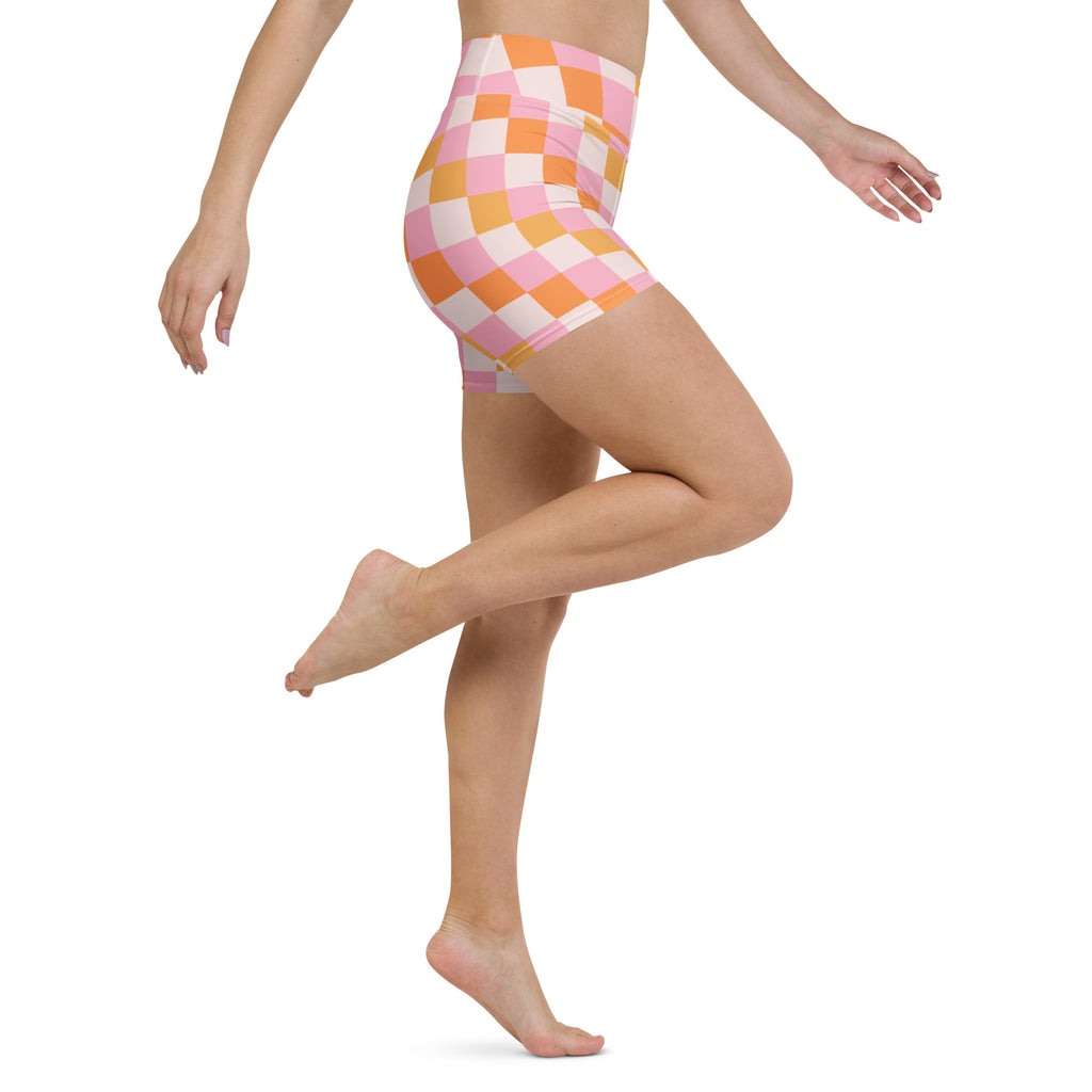 Women’s high waisted pink and orange checkered yoga shorts made from stretchy buttery soft active fabric