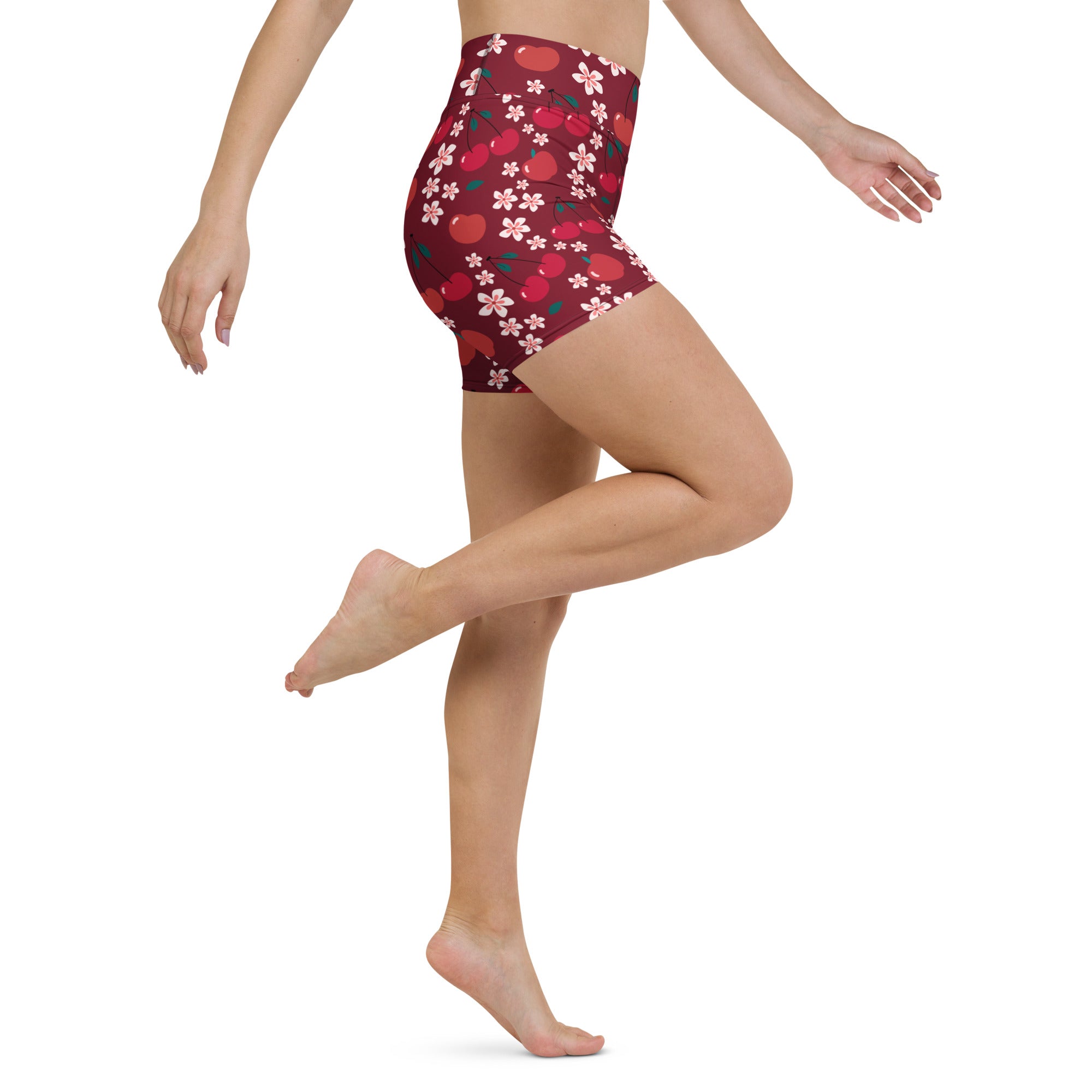 Women’s maroon high-waisted buttery soft yoga shorts with a playful red apple and white cherry blossom pattern