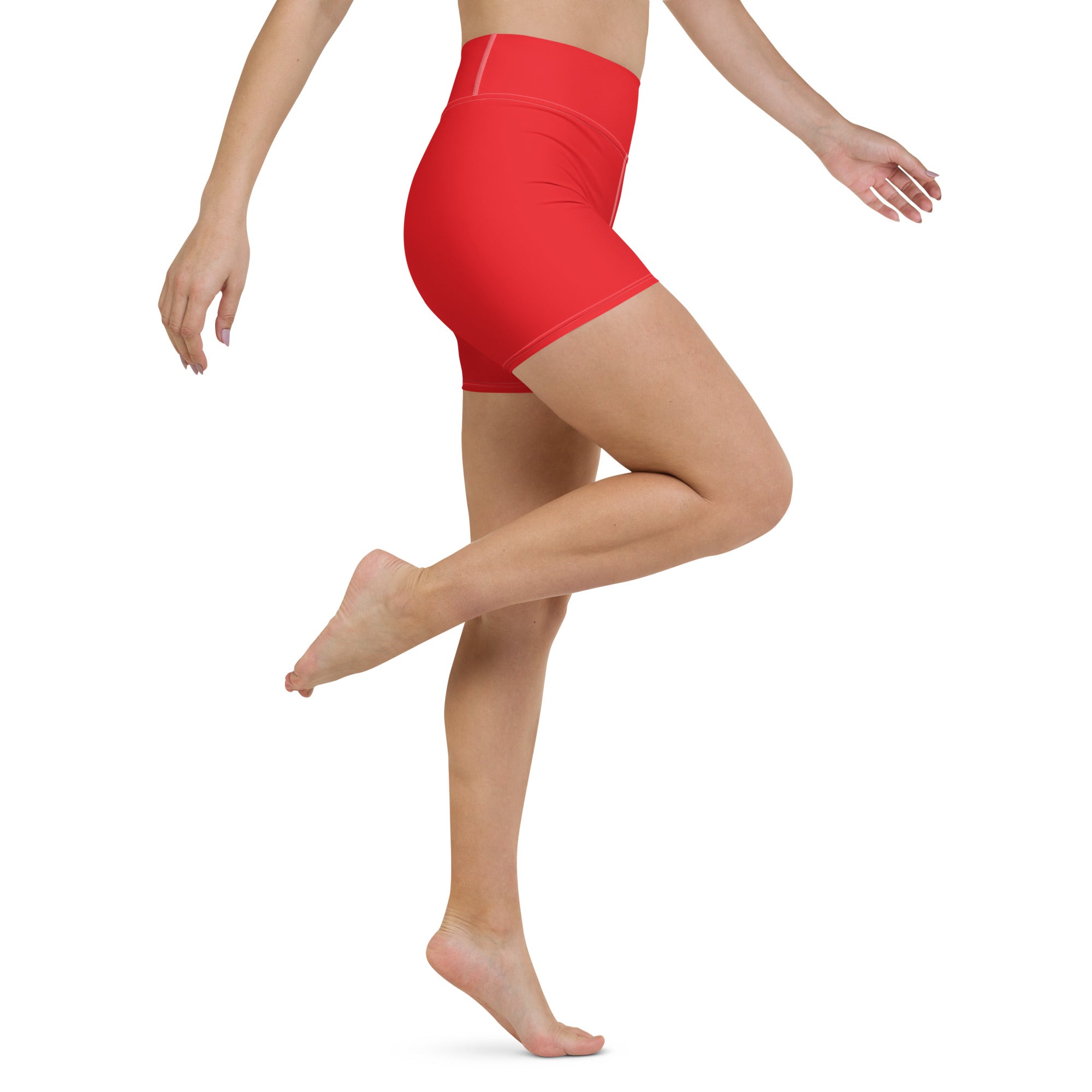 Bright red high waisted buttery soft yoga shorts made of stretchy fabric for women’s activewear