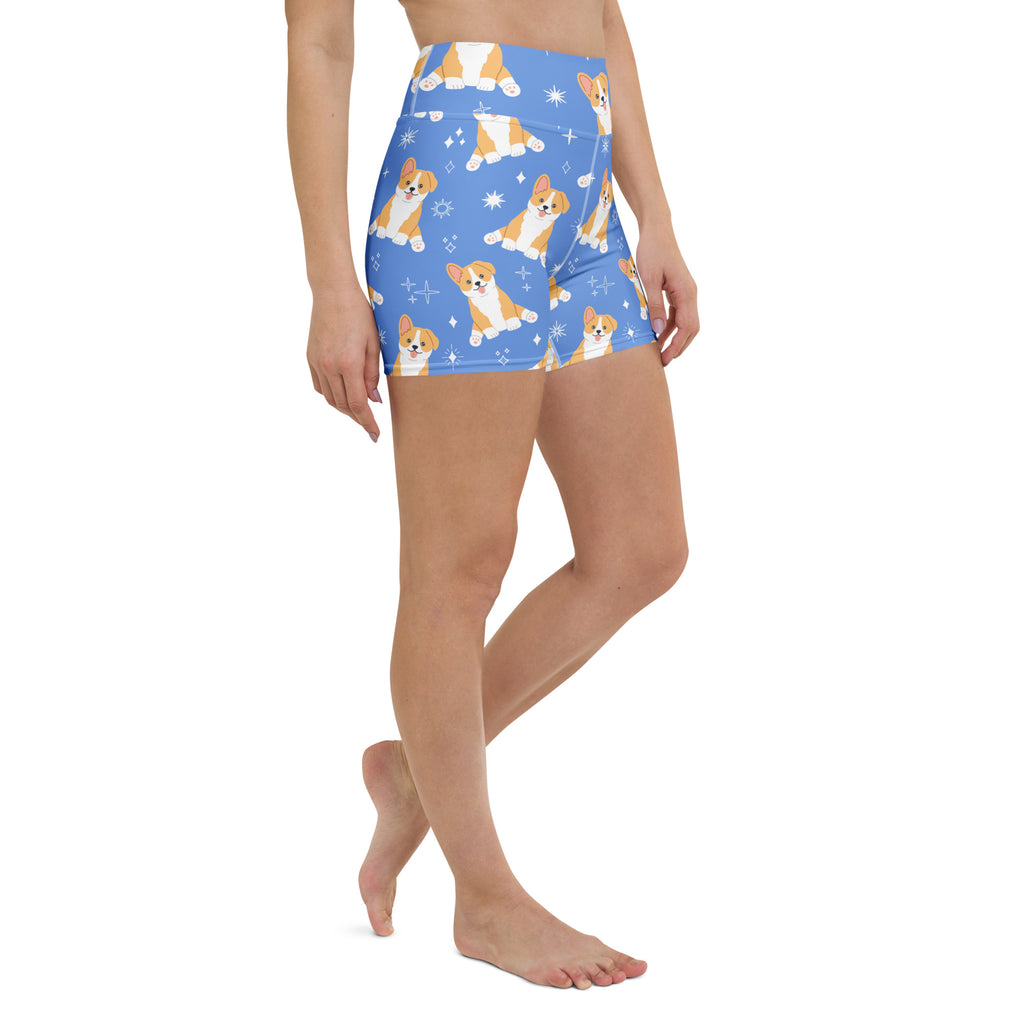 Women’s blue high waisted buttery soft yoga shorts with playful cartoon corgis and sparkles pattern