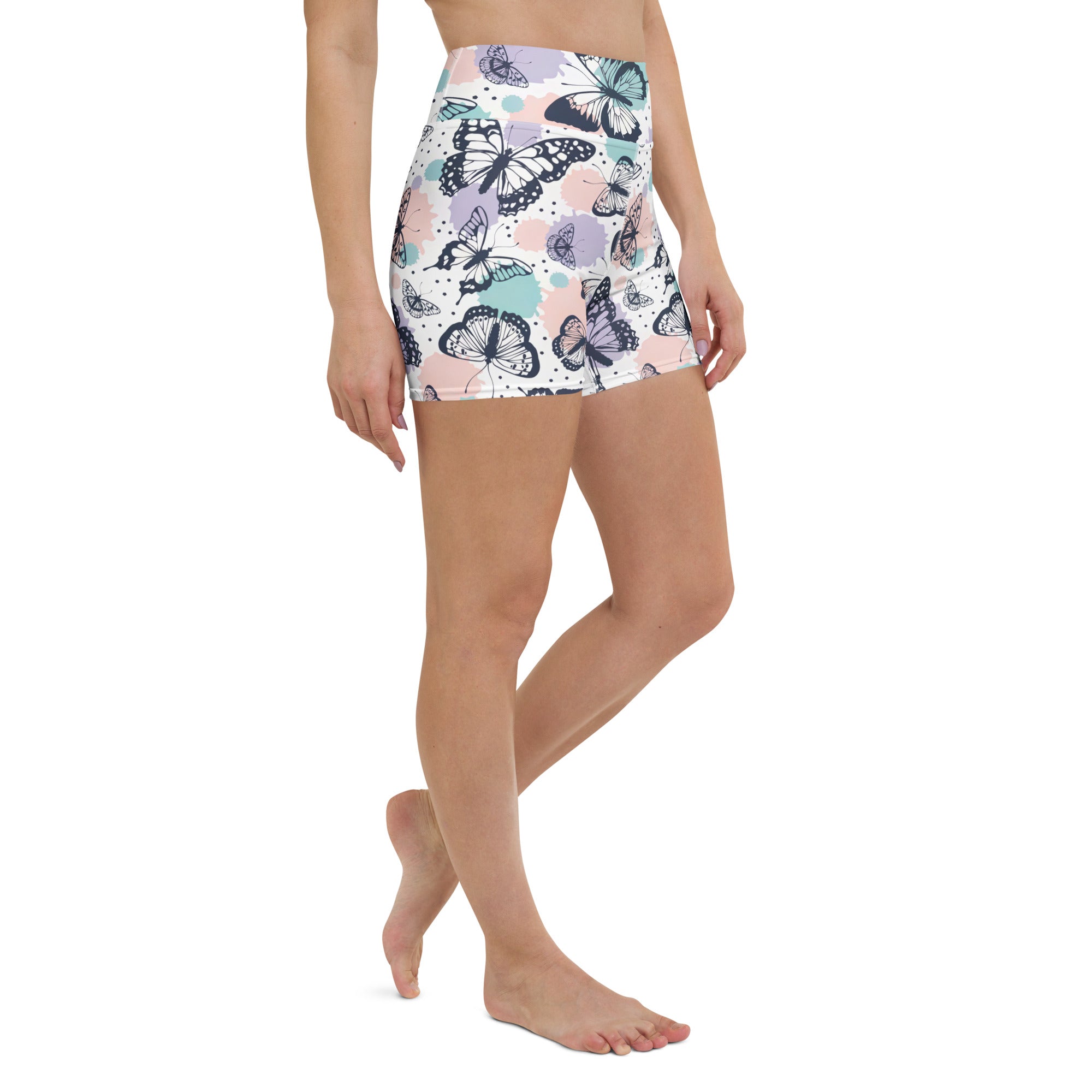 Women’s butterfly yoga shorts high waisted pastel colors with black and gray butterfly pattern on white buttery soft fabric