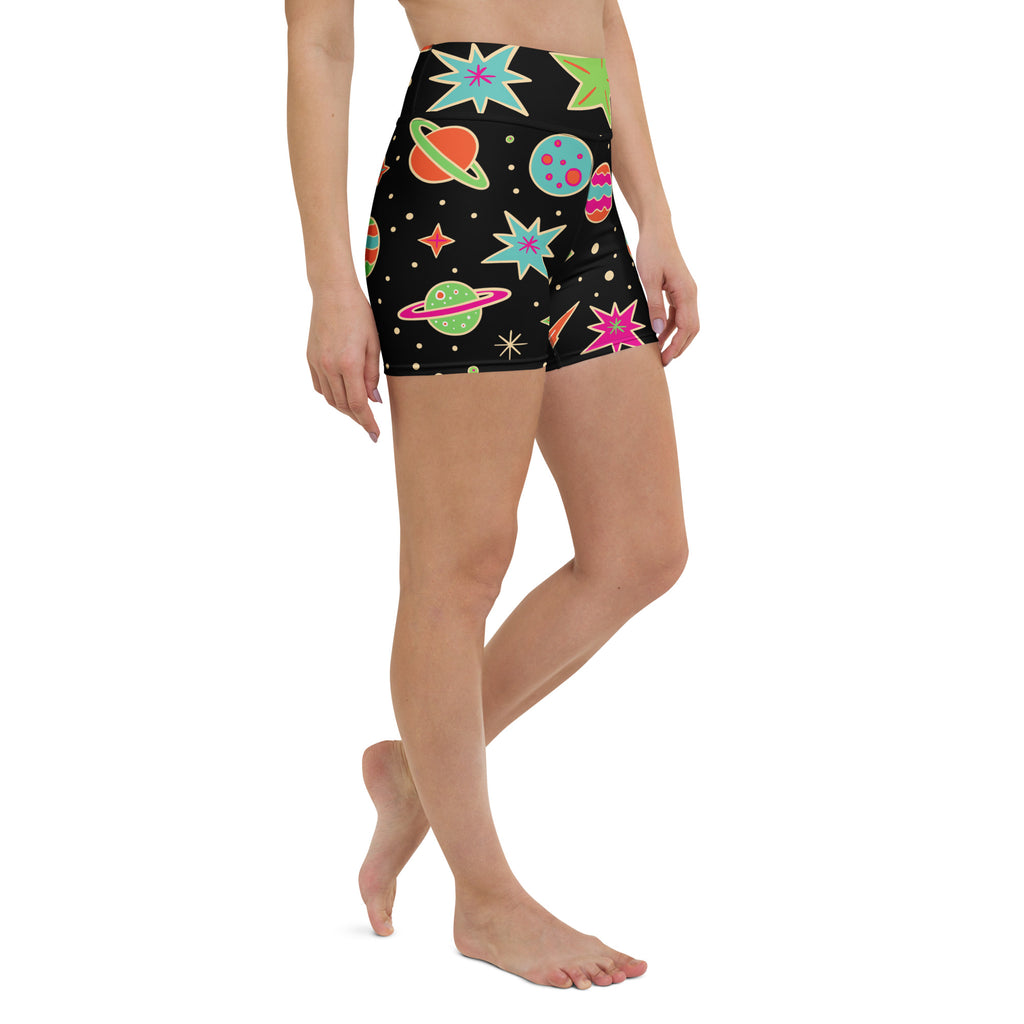 Women’s retro space yoga shorts with high waisted fit buttery soft black fabric and colorful cosmic pattern