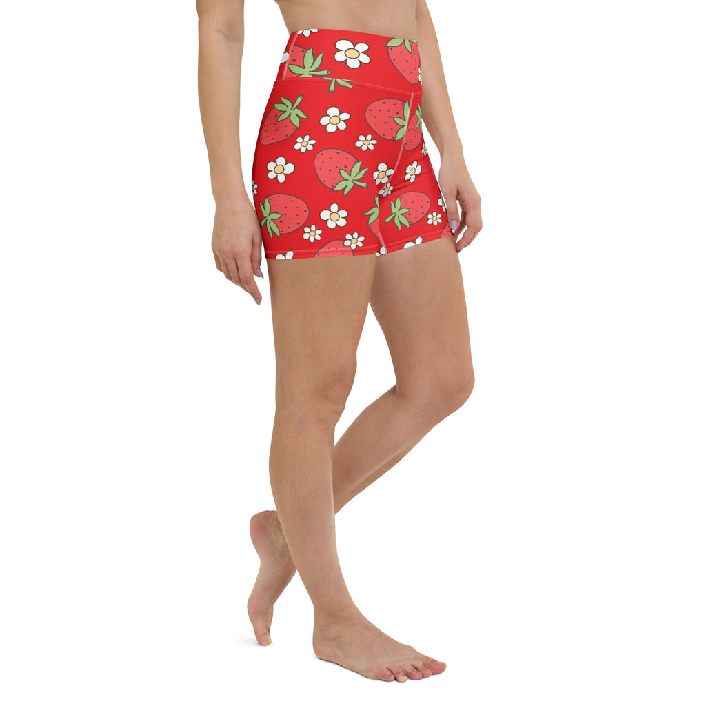 Women’s red high-waisted buttery soft yoga shorts with a playful strawberry and white floral pattern