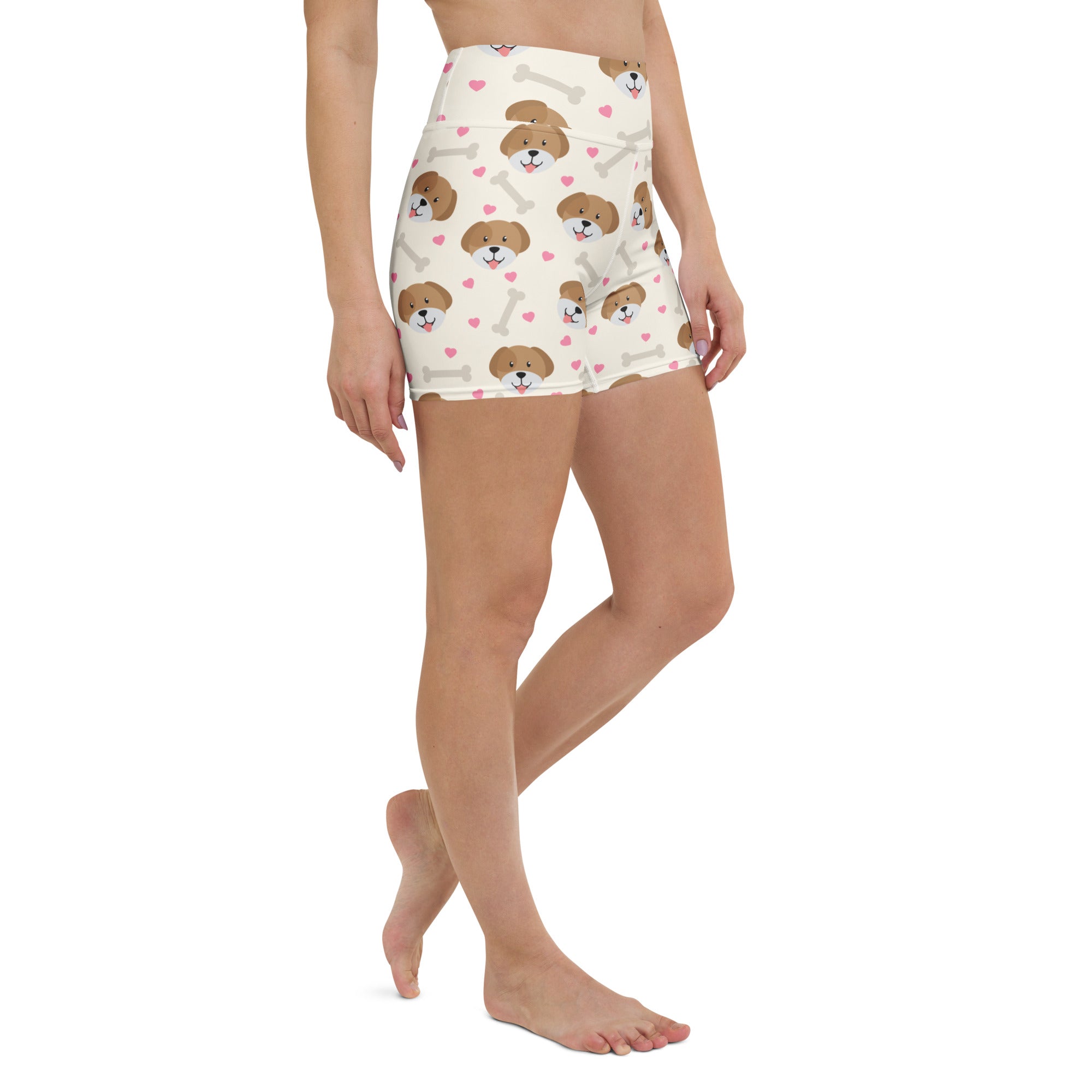 Women’s high waisted buttery soft cream shorts with brown dog faces pink hearts and white bones for yoga and activewear