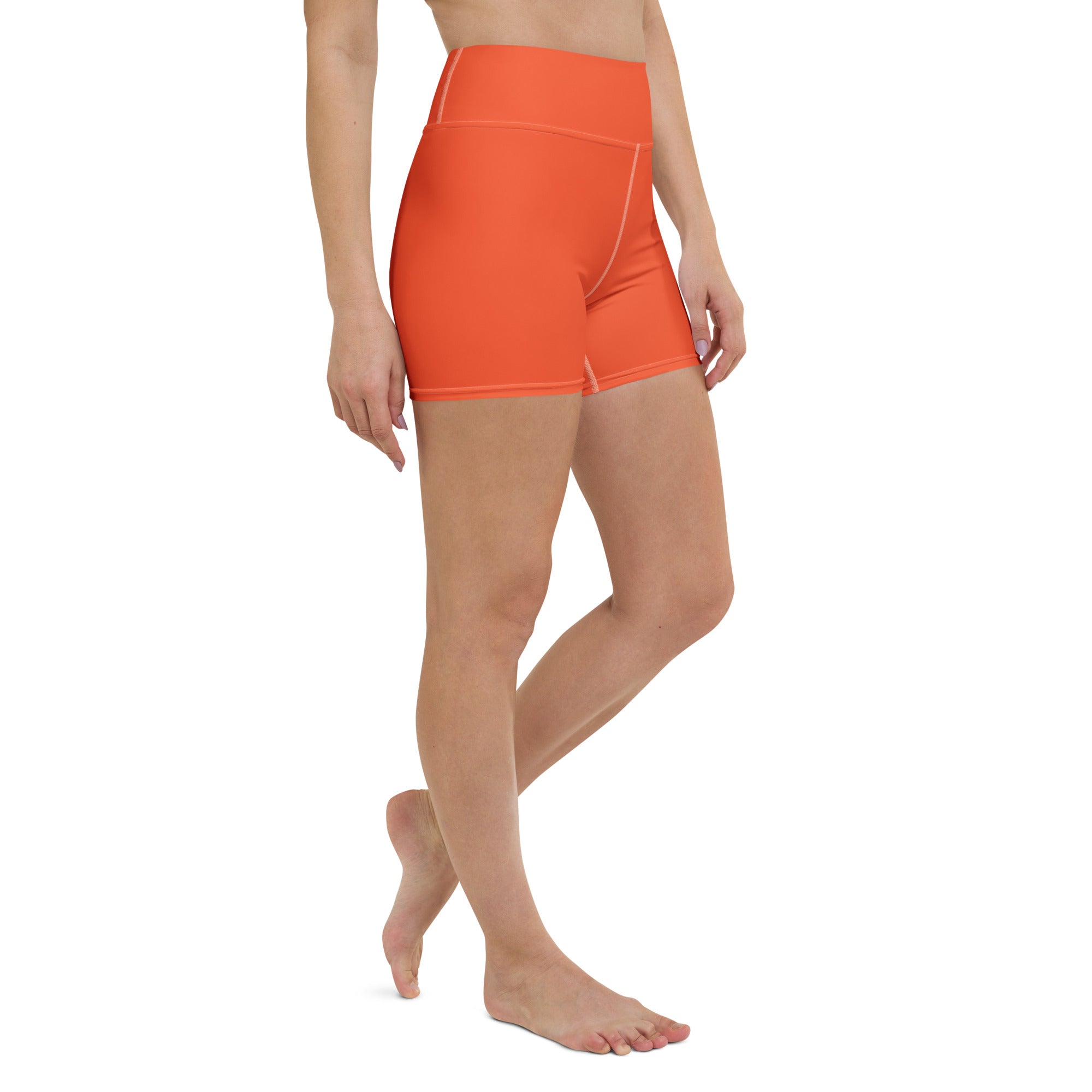 Women’s buttery soft orange high waisted yoga shorts with seamless stretchy fabric for activewear