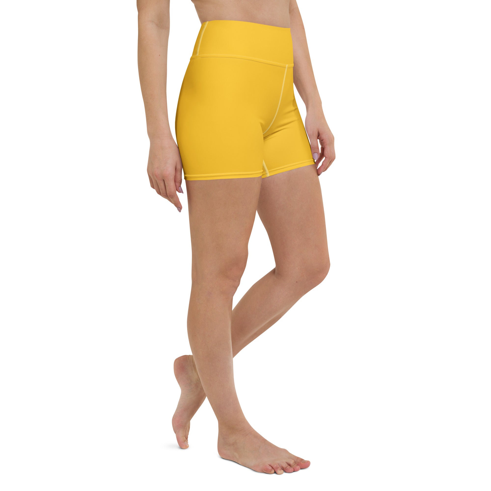 Bright yellow high-waisted buttery soft yoga shorts for women designed as comfortable activewear pants