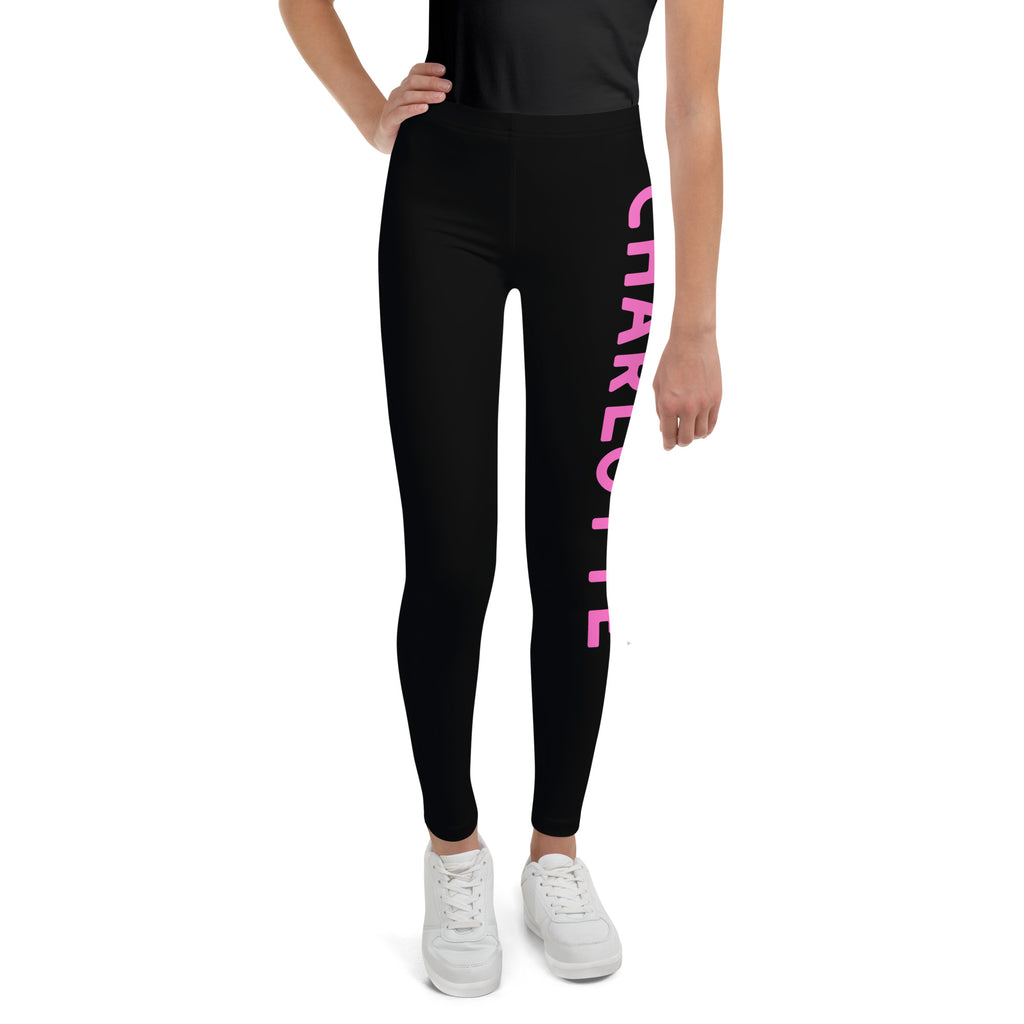 Girls custom color and name buttery soft black leggings with vertical pink charlotte text design on the front