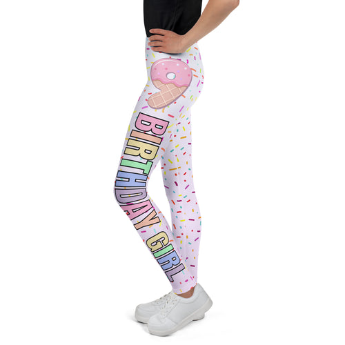 Pink and white buttery soft leggings with colorful birthday girl rainbow text sprinkles and pink donut on ice cream design