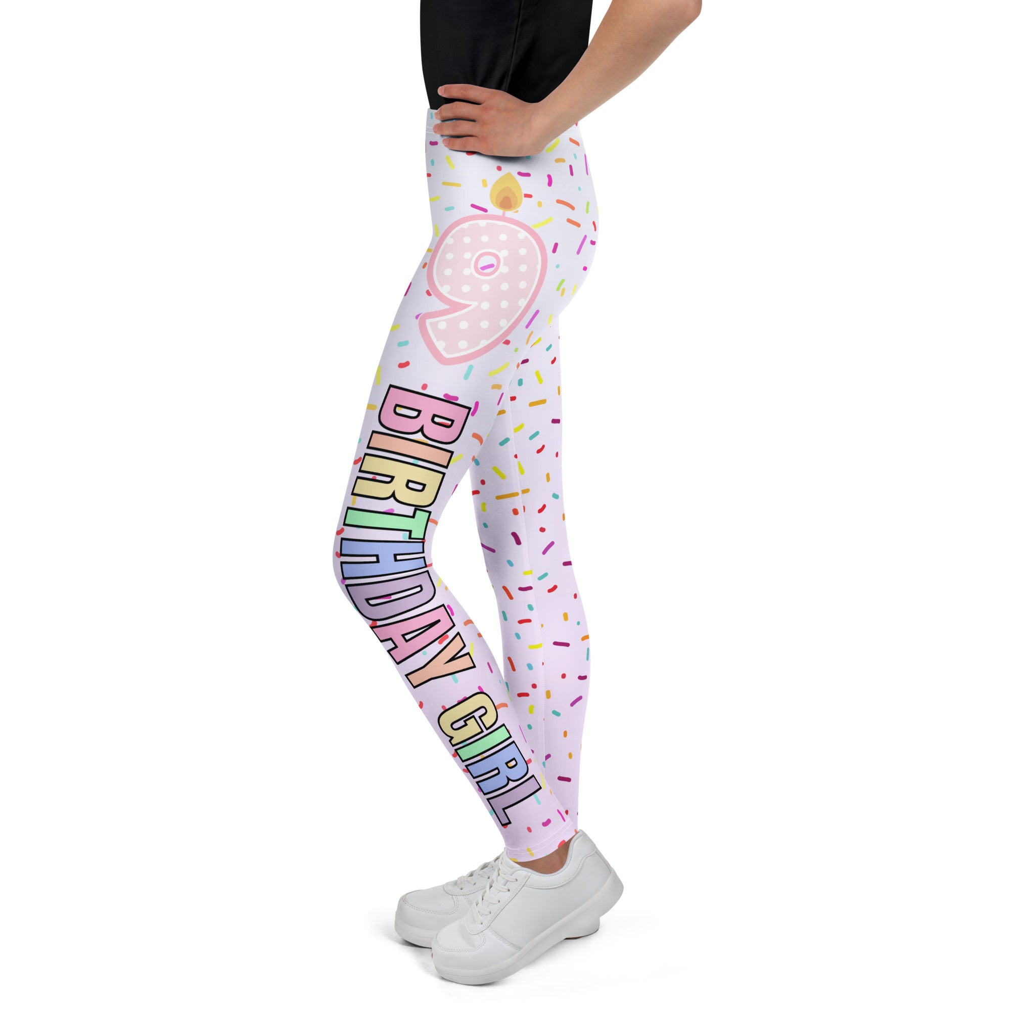 Pink and white buttery soft leggings with colorful 9 birthday girl design featuring rainbow lettering and sprinkles