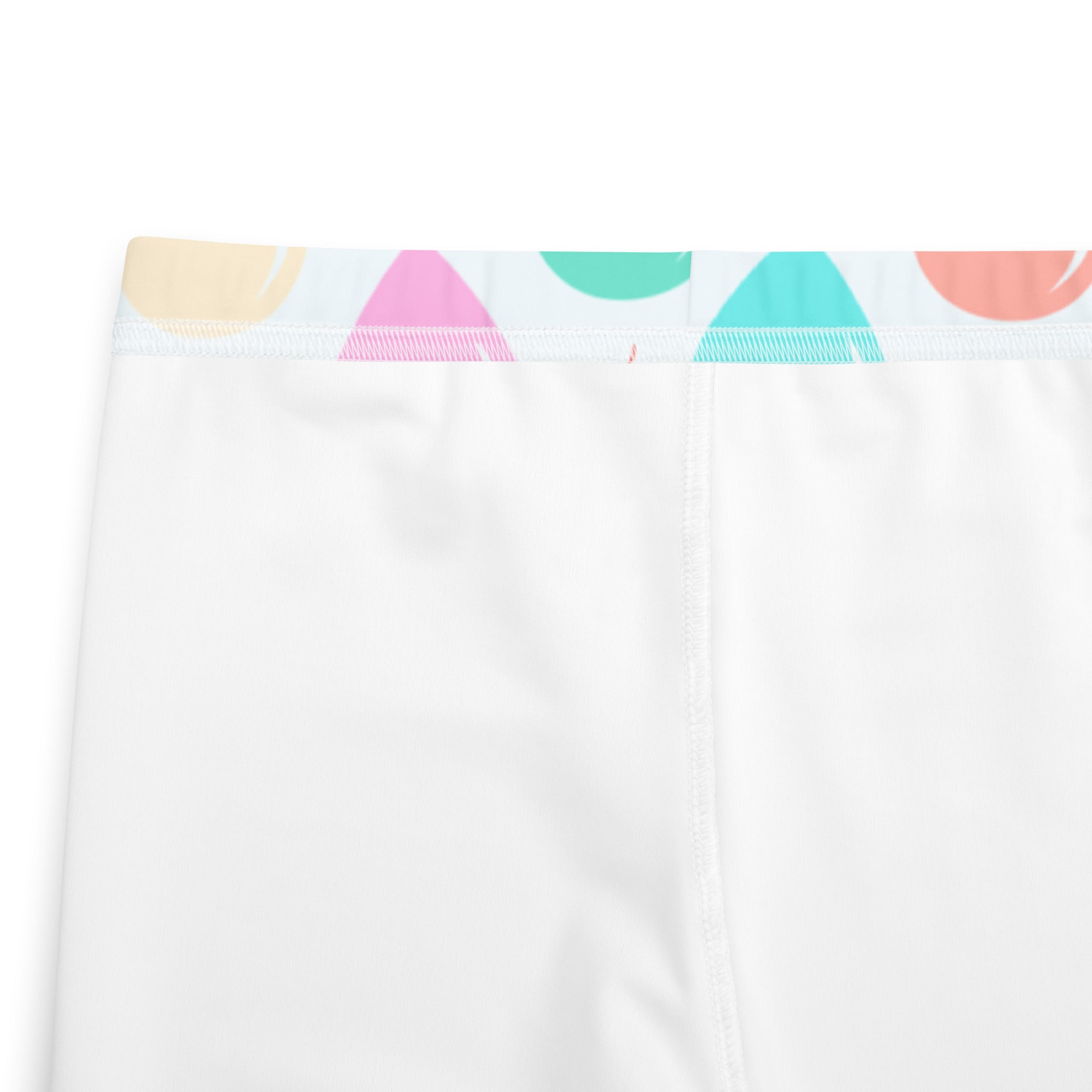 White shower curtain with colorful pastel geometric hem featuring pink teal and peach triangles and semi circles