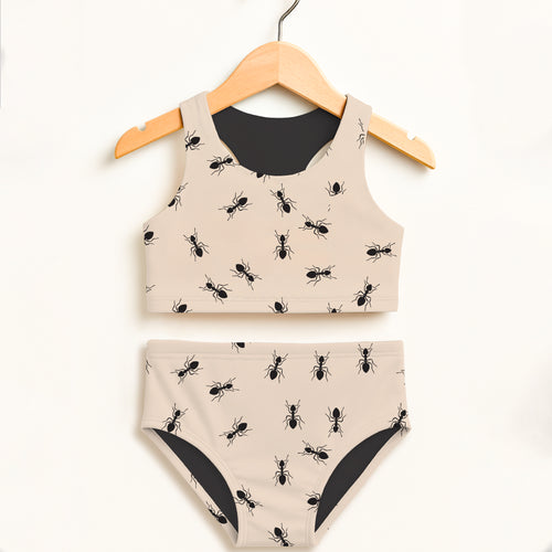 Beige girls two-piece swimsuit with black ant prints and lining double layered upf 50 plus high waisted comfort