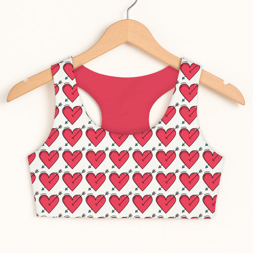 Girls arrow heart sports bra white with red hearts and arrows pattern and solid pink quick drying interior lining
