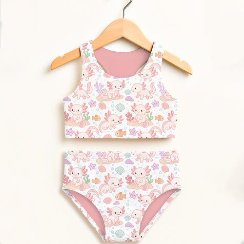 A charming white girls axolotl two piece swimsuit with pink axolotls starfish seashells and UPF 50+ protection