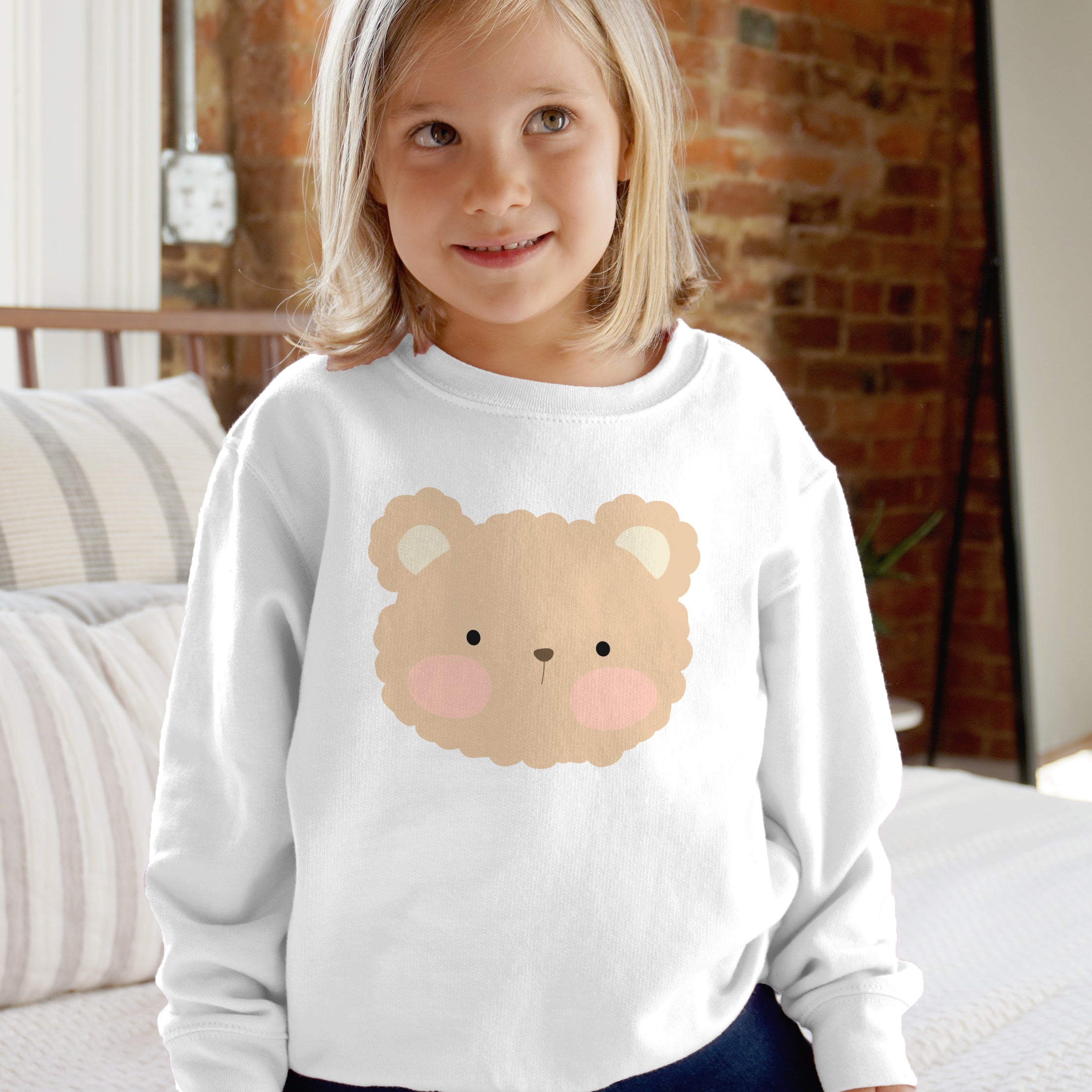 White long-sleeved kids teddy bear sweatshirt with cute cartoon bear face featuring pink cheeks and soft beige fur