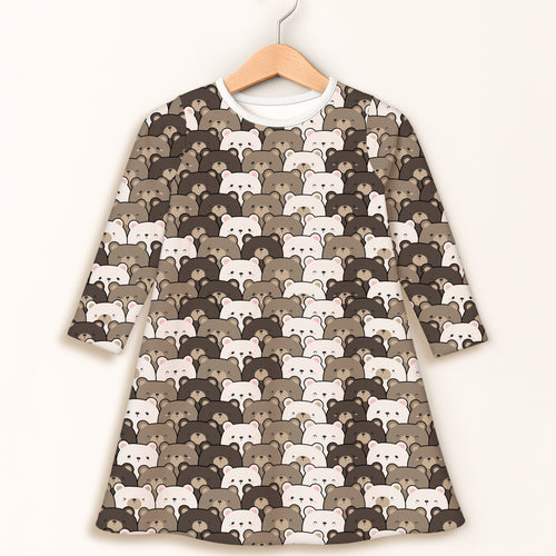Girls brown long-sleeve dress with playful cartoon bear pattern hanging on wooden hanger