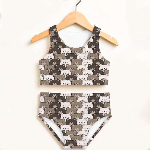 Girls bear face two piece swimsuit with brown and white cartoon bears on wooden hanger featuring upf 50 plus fabric