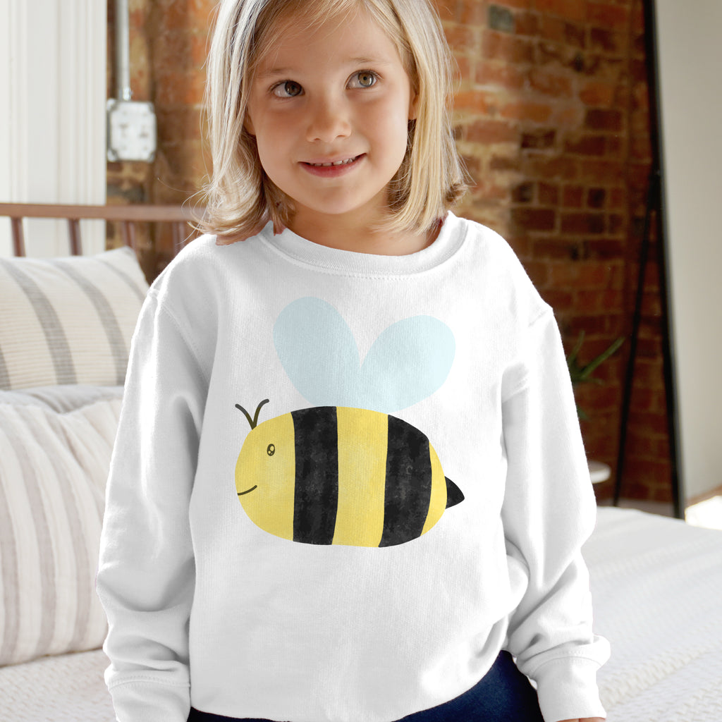 White long-sleeved kids sweatshirt with a cute cartoon yellow and black bee and light blue wings on the front