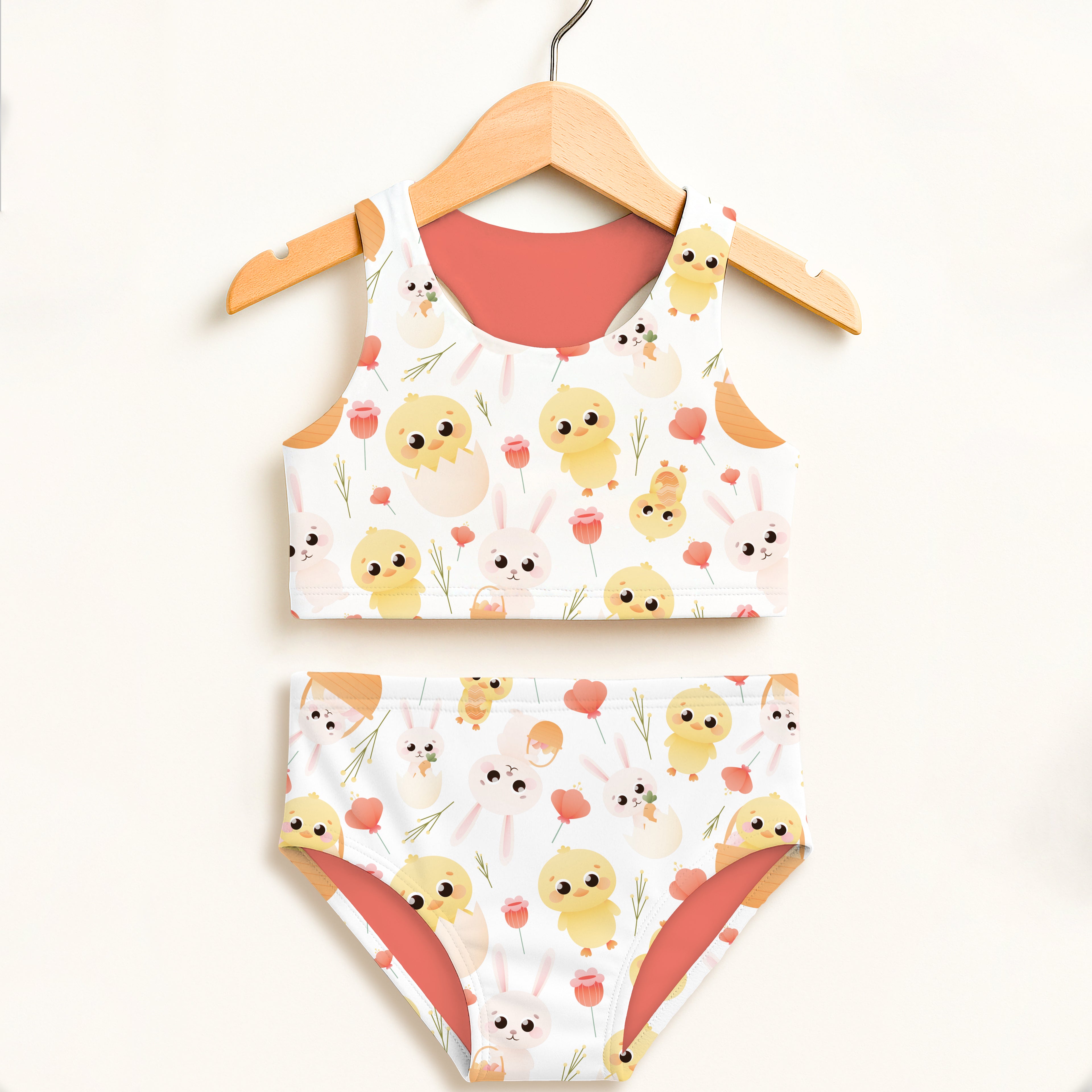 Girls chick and bunny two piece swimsuit in white and coral with cartoon chicks bunnies and flowers double layered upf 50+