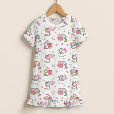 Girls unicorn birthday short sleeve ruffle hem dress in white with playful cartoon unicorns hearts and clouds pattern