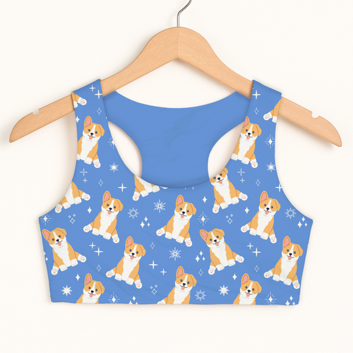Girls blue corgi dog sports bra with quick drying fabric and playful tan white corgi pattern with starbursts