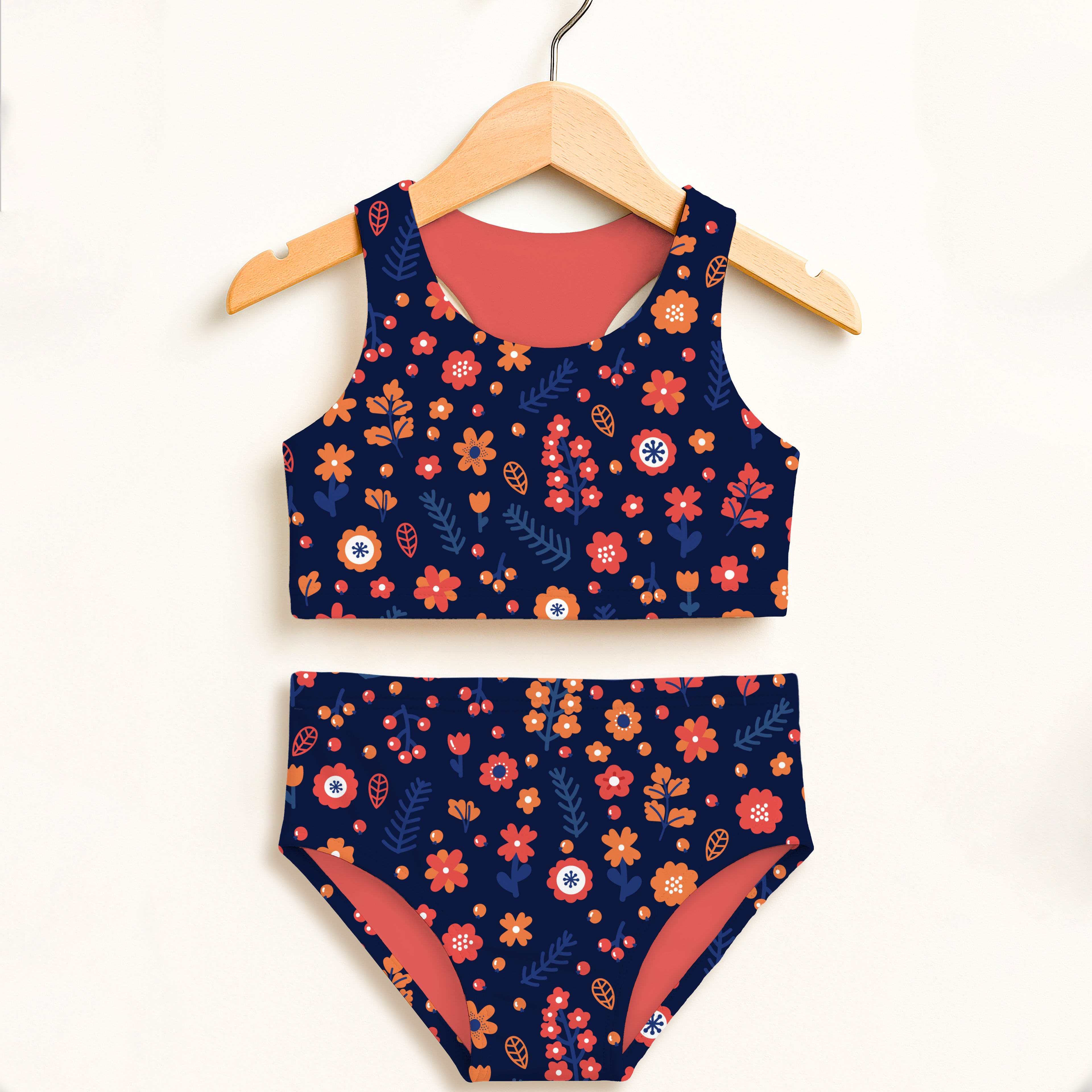 Girls navy floral two piece swimsuit with orange red blossoms coral lining double layered upf 50 high waisted comfort