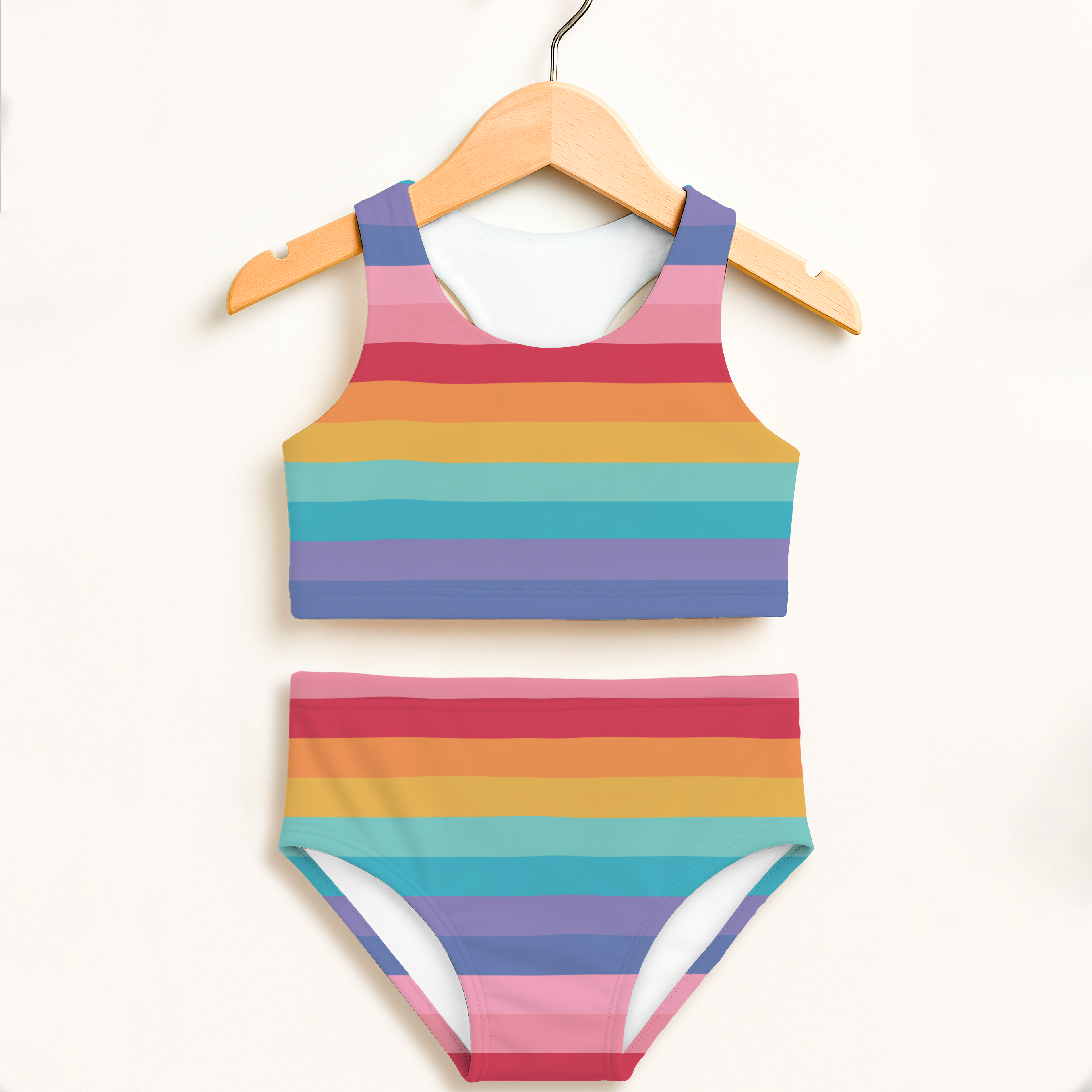 Girls bright rainbow stripes two piece swimsuit with vibrant horizontal colors and upf 50+ high waisted comfort