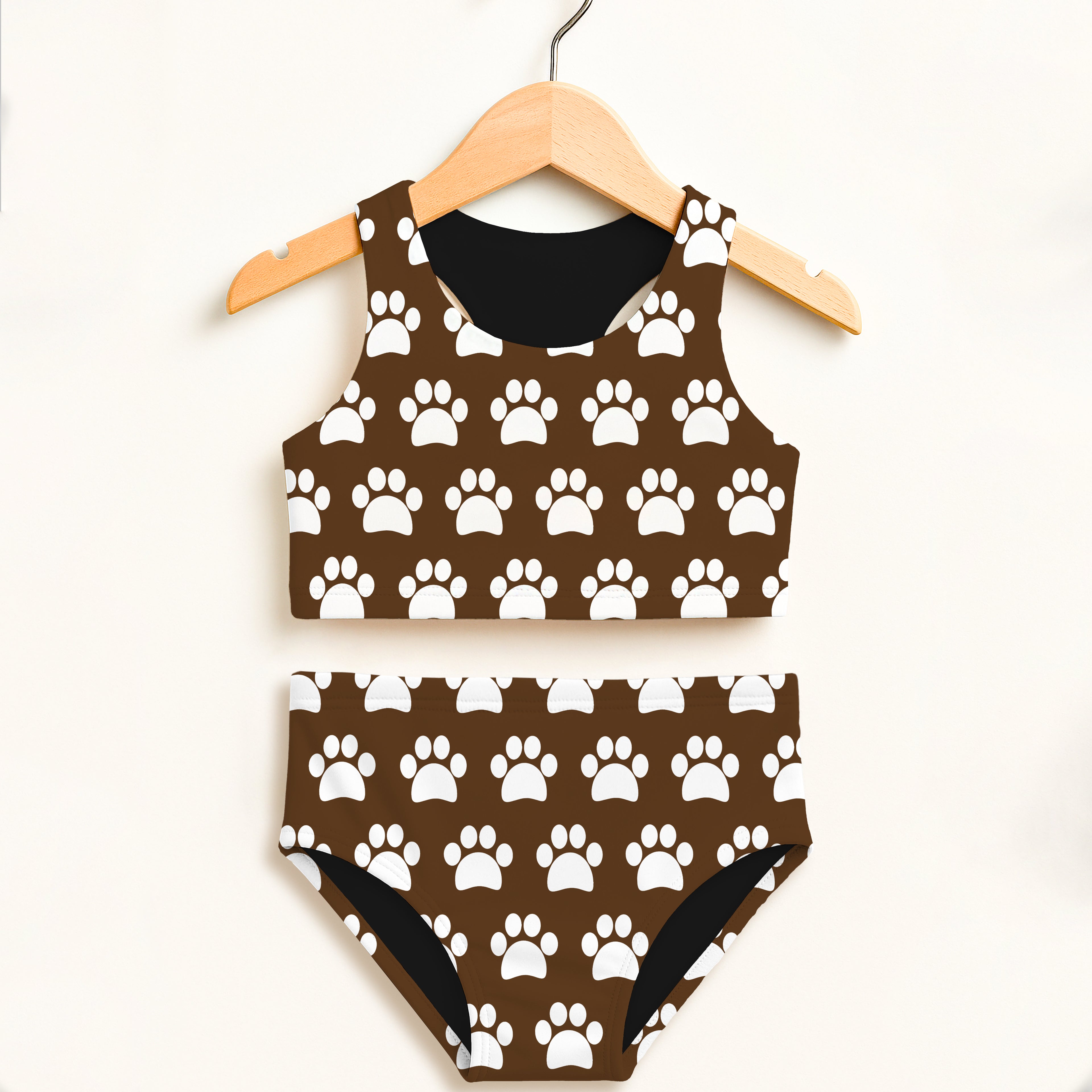 Girls brown paw print two piece swimsuit with black lining halter neckline double layered upf 50 plus high waisted comfort