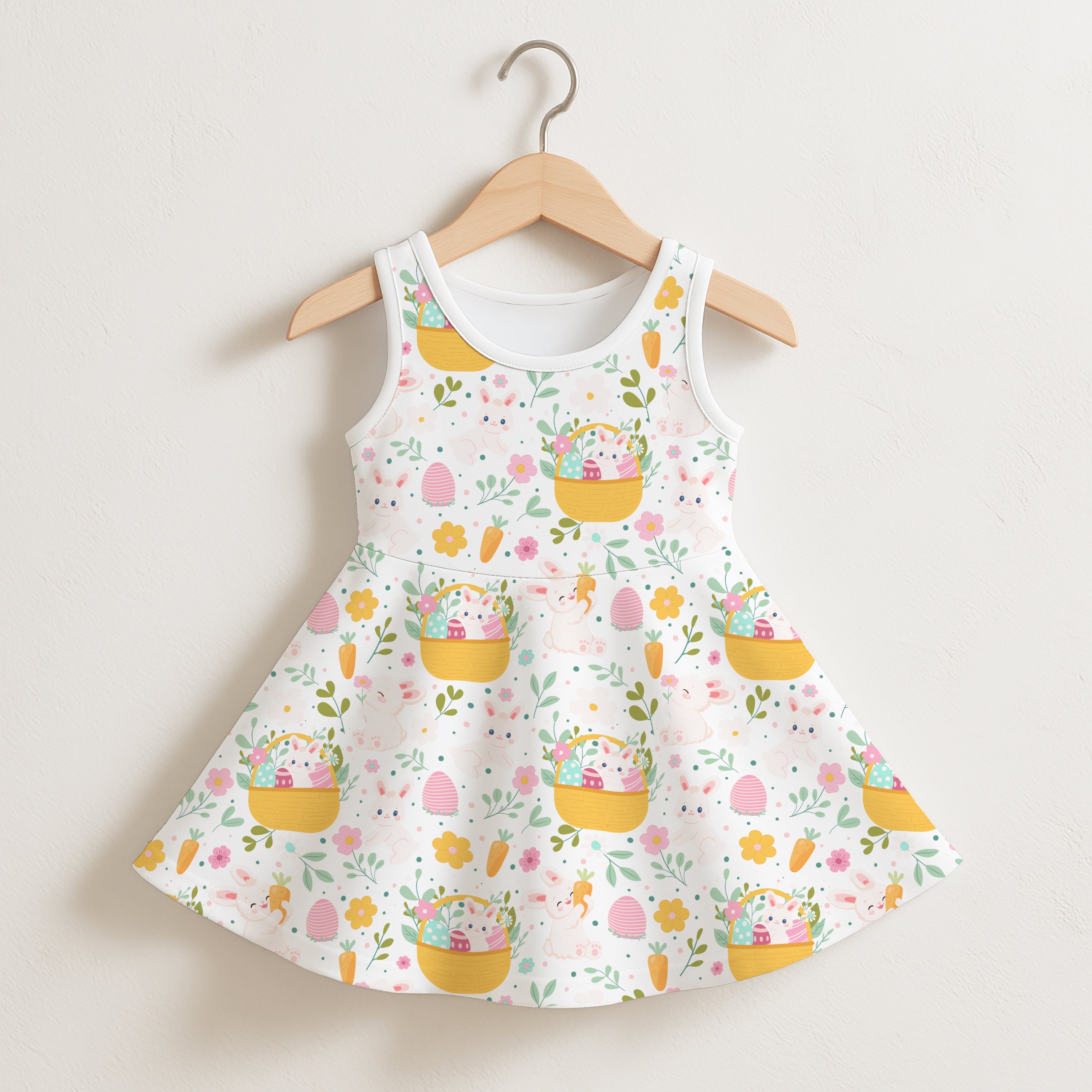 Girls floral Easter bunny sleeveless dress in white with a flared skirt and yellow basket pattern with pastel eggs and carrots