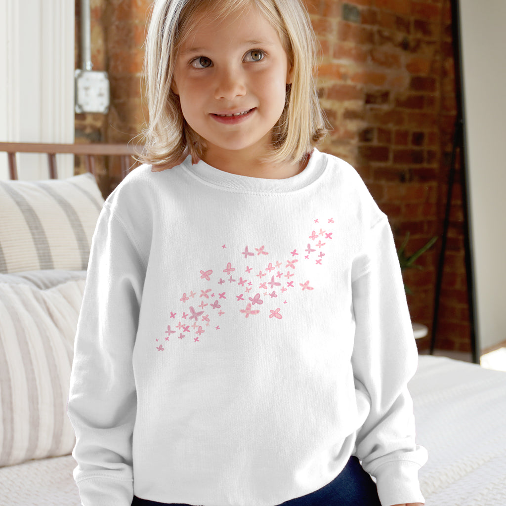 White girls long-sleeved sweatshirt with pink butterfly pattern across the chest soft pullover for casual wear