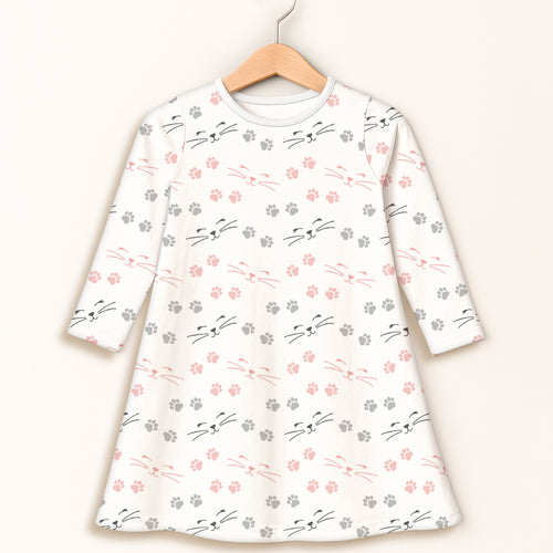 Girls cat paw long sleeve dress in white with pink and gray cat faces and paw print pattern for children
