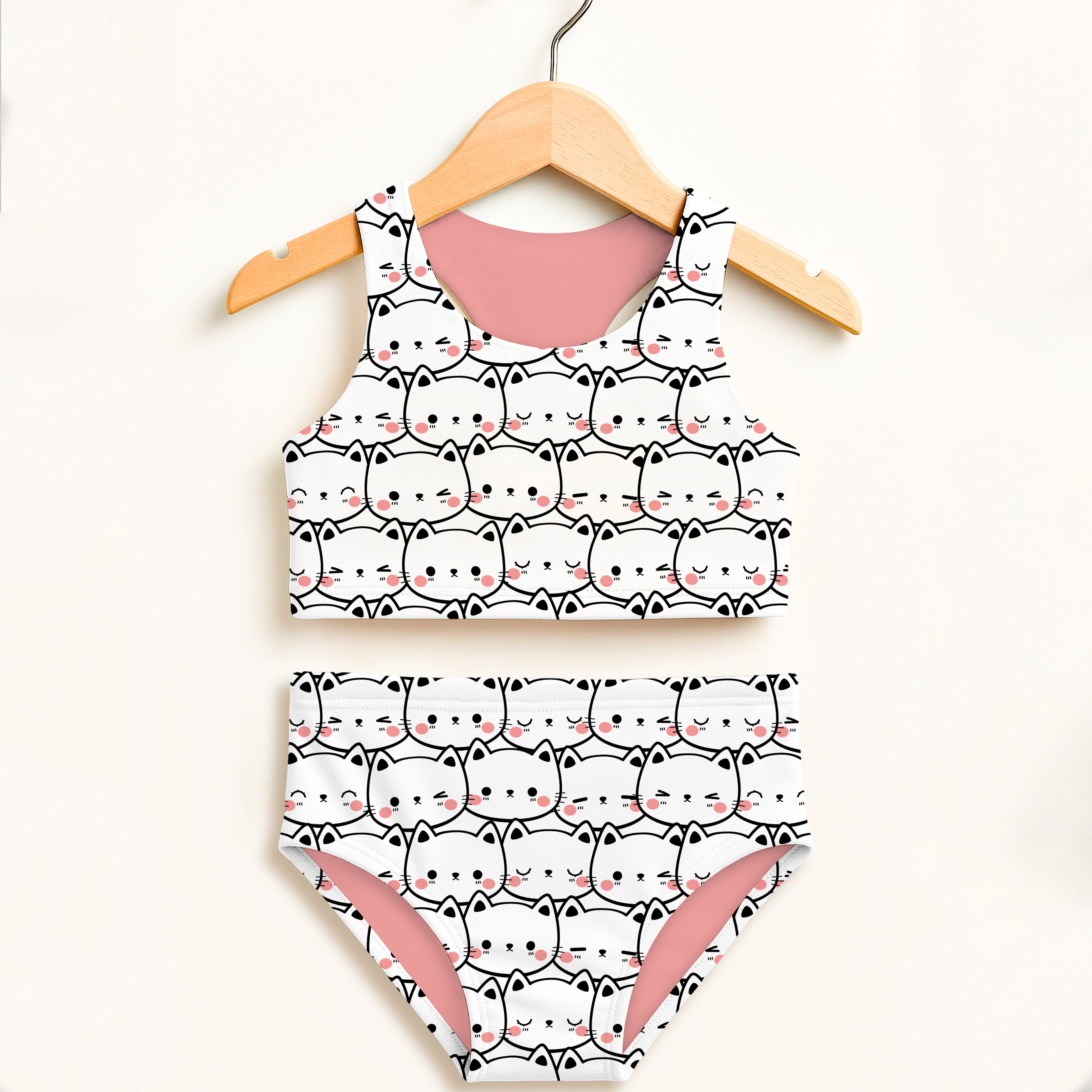 Girls cat print two-piece swimsuit with white fabric pink lining black outlines and double layered UPF 50+ protection