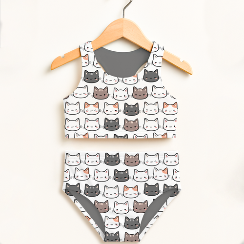White girls cat two-piece swimsuit with playful cartoon cats pattern, double layered fabric and upf 50+ high waisted design