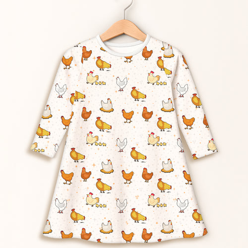 Girls chicken long sleeve dress in white featuring playful orange yellow and gray cartoon chicken pattern