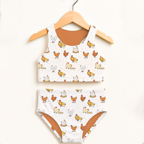 Girls chicken pattern two piece swimsuit with orange chicks on white fabric and tan lining double layered upf 50+ high waisted