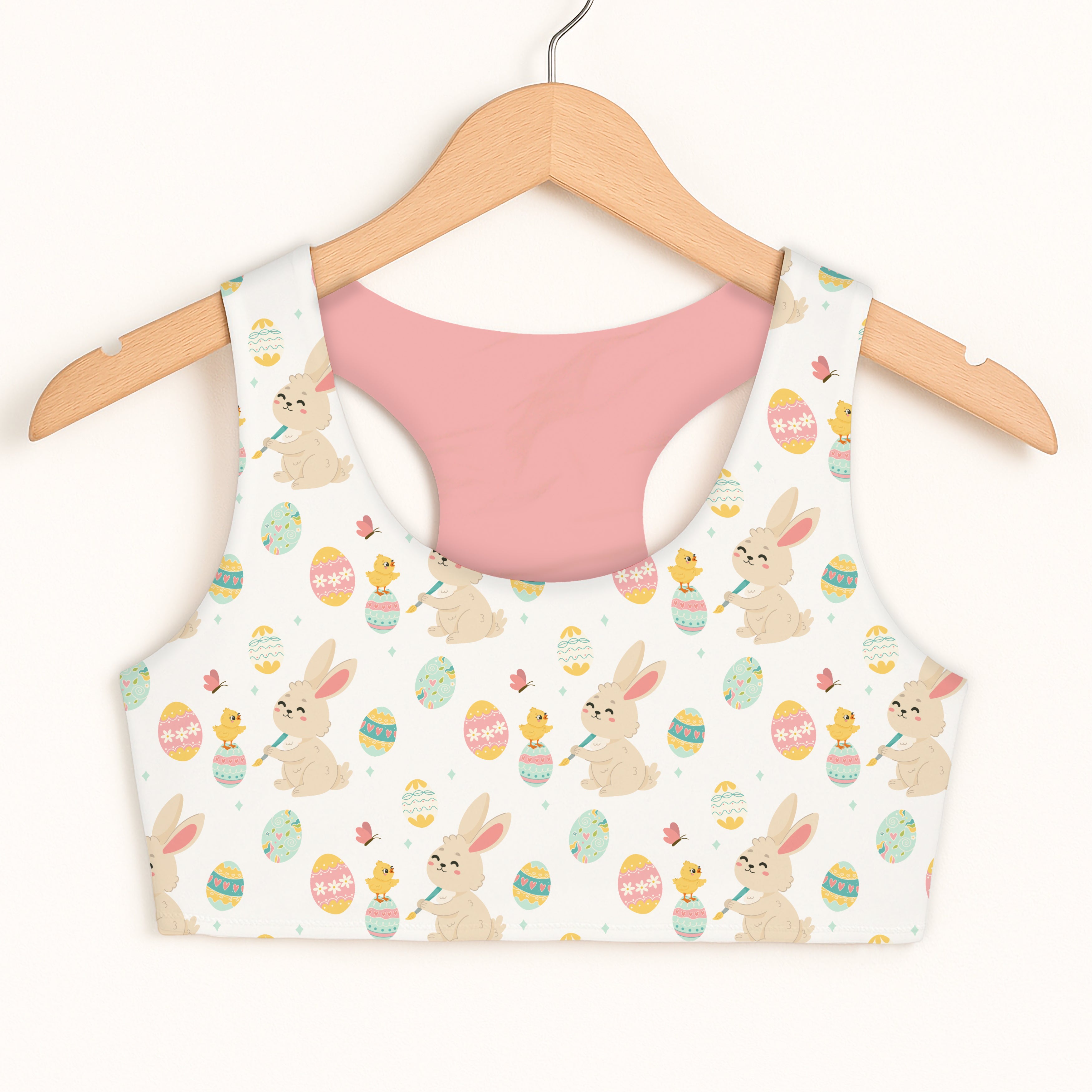 Girls bunny and chick easter sports bra with white cropped top featuring beige bunnies yellow chicks and pastel eggs