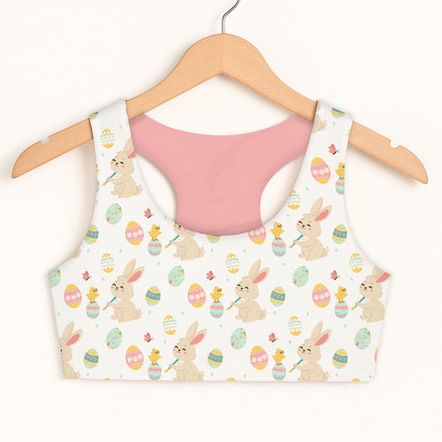 Girls bunny and chick easter sports bra with white cropped top featuring beige bunnies yellow chicks and pastel eggs
