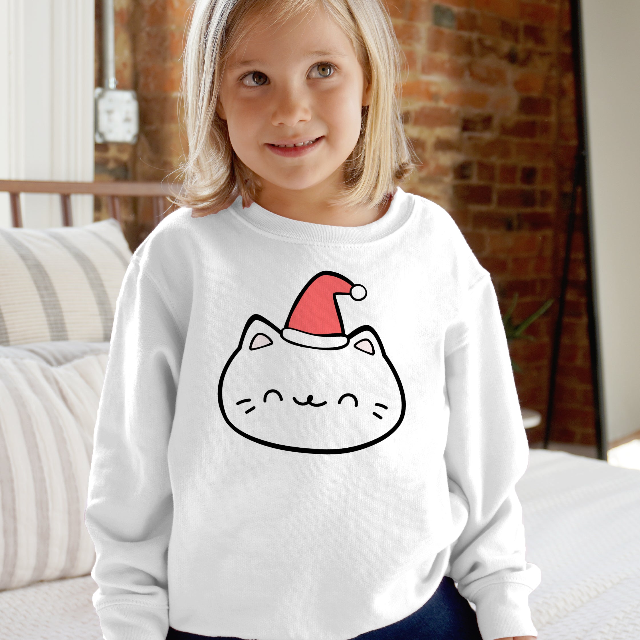 White long-sleeved kids christmas cat sweatshirt with cartoon cat wearing red santa hat in black outline