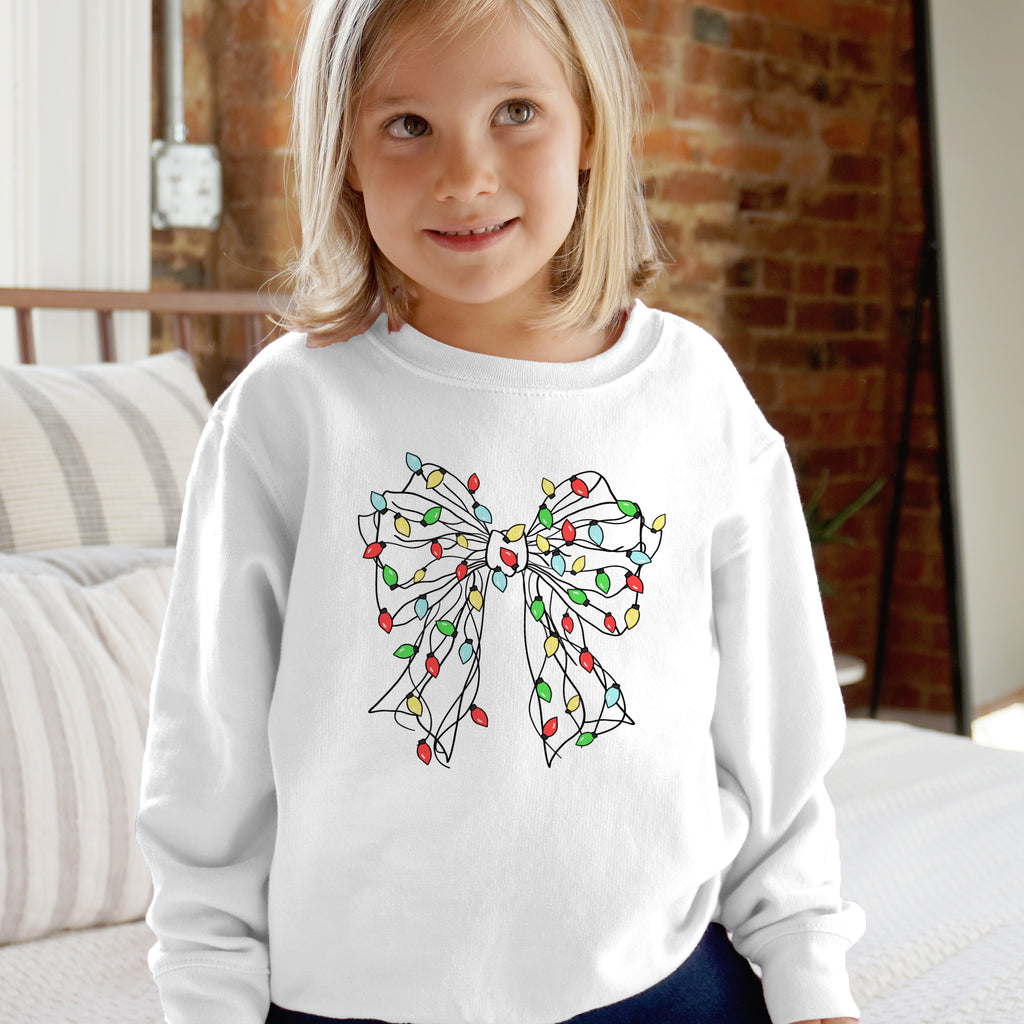 White kids long-sleeved sweatshirt with colorful string lights bow print for festive holiday wear