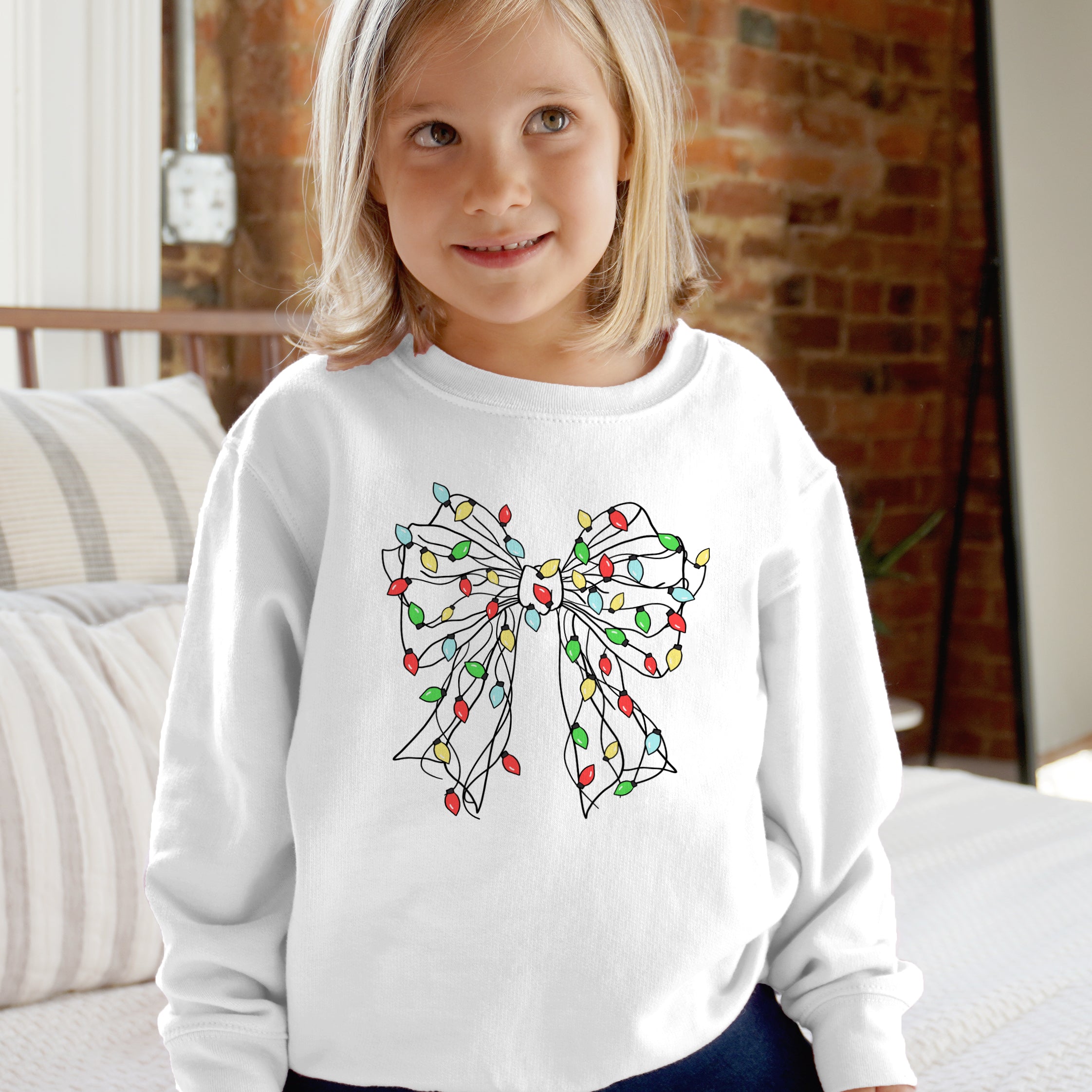 White kids long-sleeved sweatshirt with colorful string lights bow print for festive holiday wear