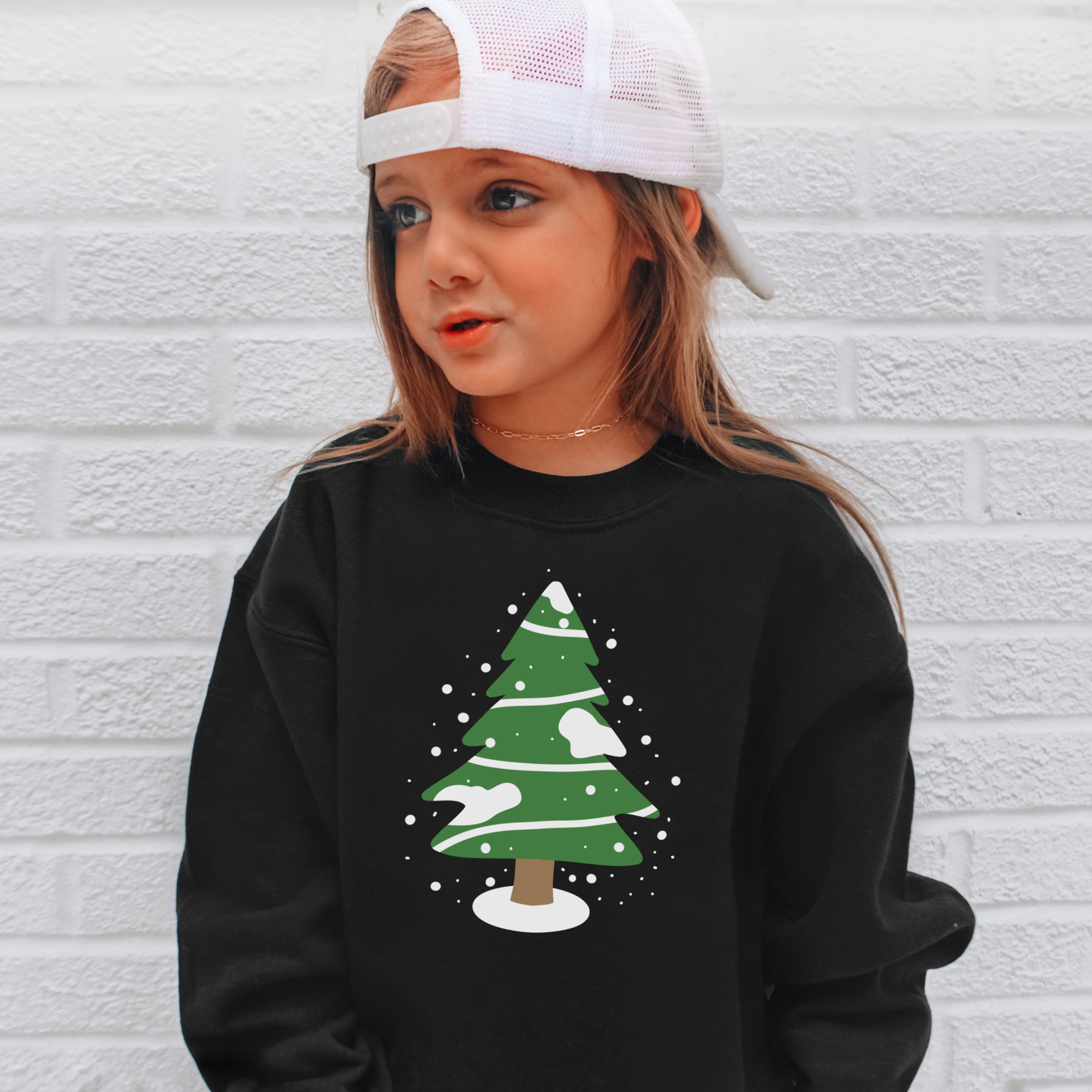 Black long-sleeved sweatshirt with green christmas tree and white snowflakes kids snowy christmas tree pullover