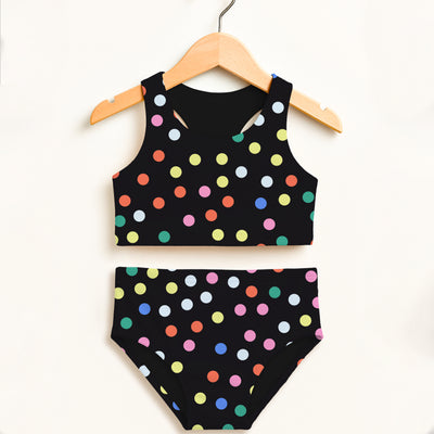 Black polka dot two-piece swimsuit with colorful pink yellow blue green orange dots and upf 50+ high waisted comfort